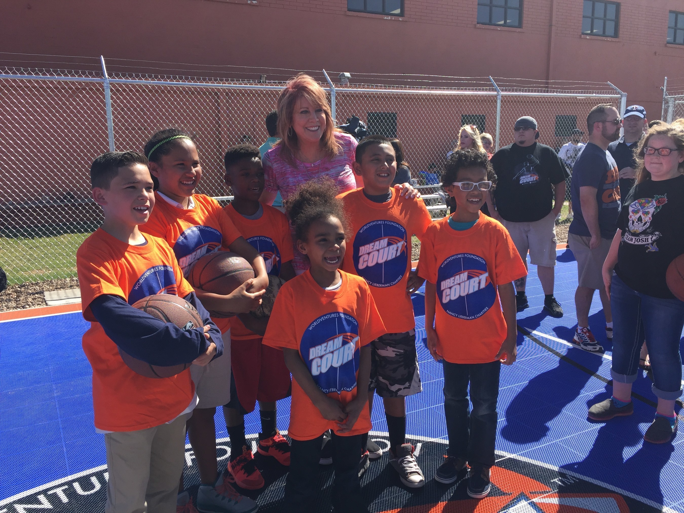 Nancy Lieberman and members of the "Maverick" Boys & Girls Clubs Amarillo and Canyon on new DreamCourt