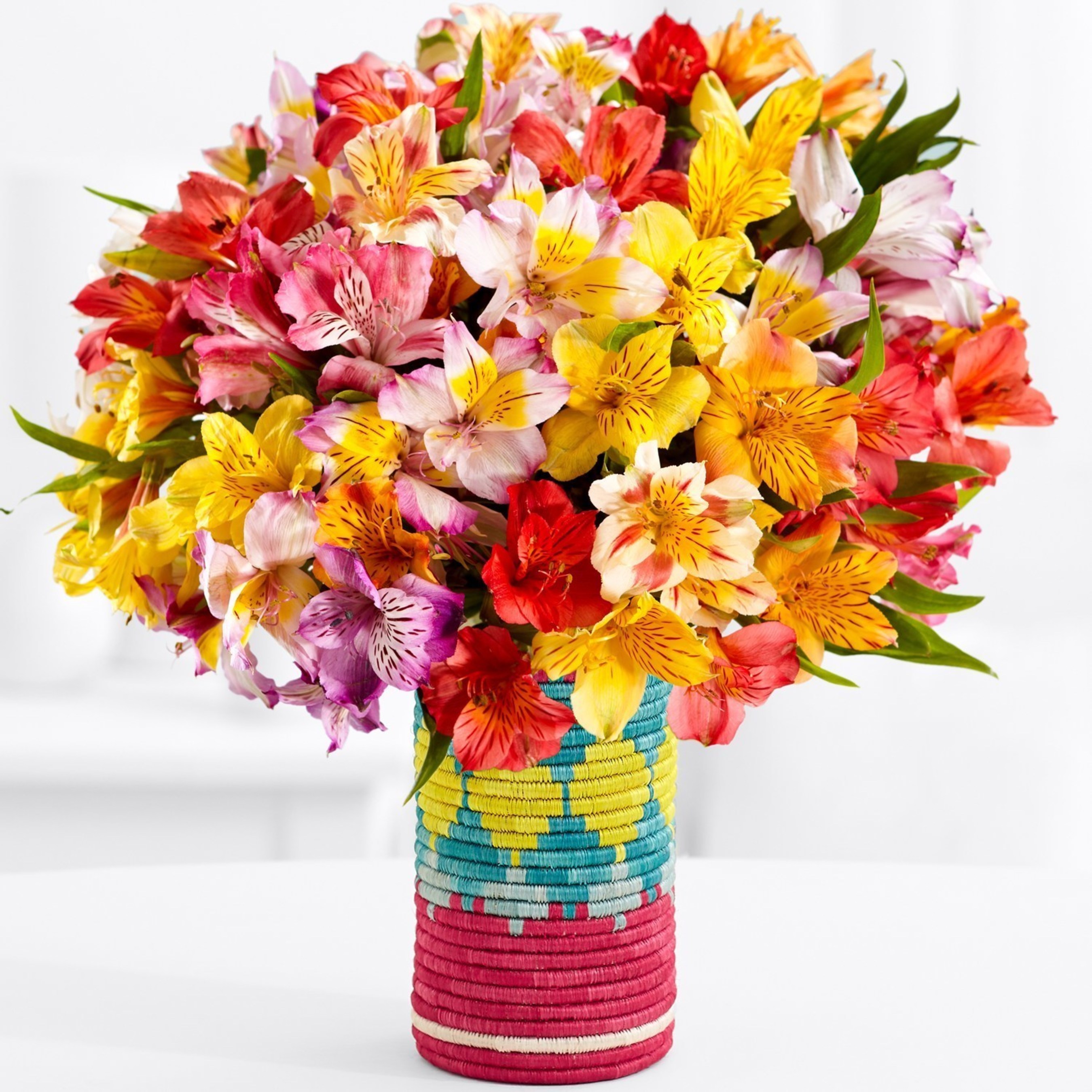 The ProFlowers All Across Africa collection for Mother's Day features exclusive vases handmade by African Artisans.