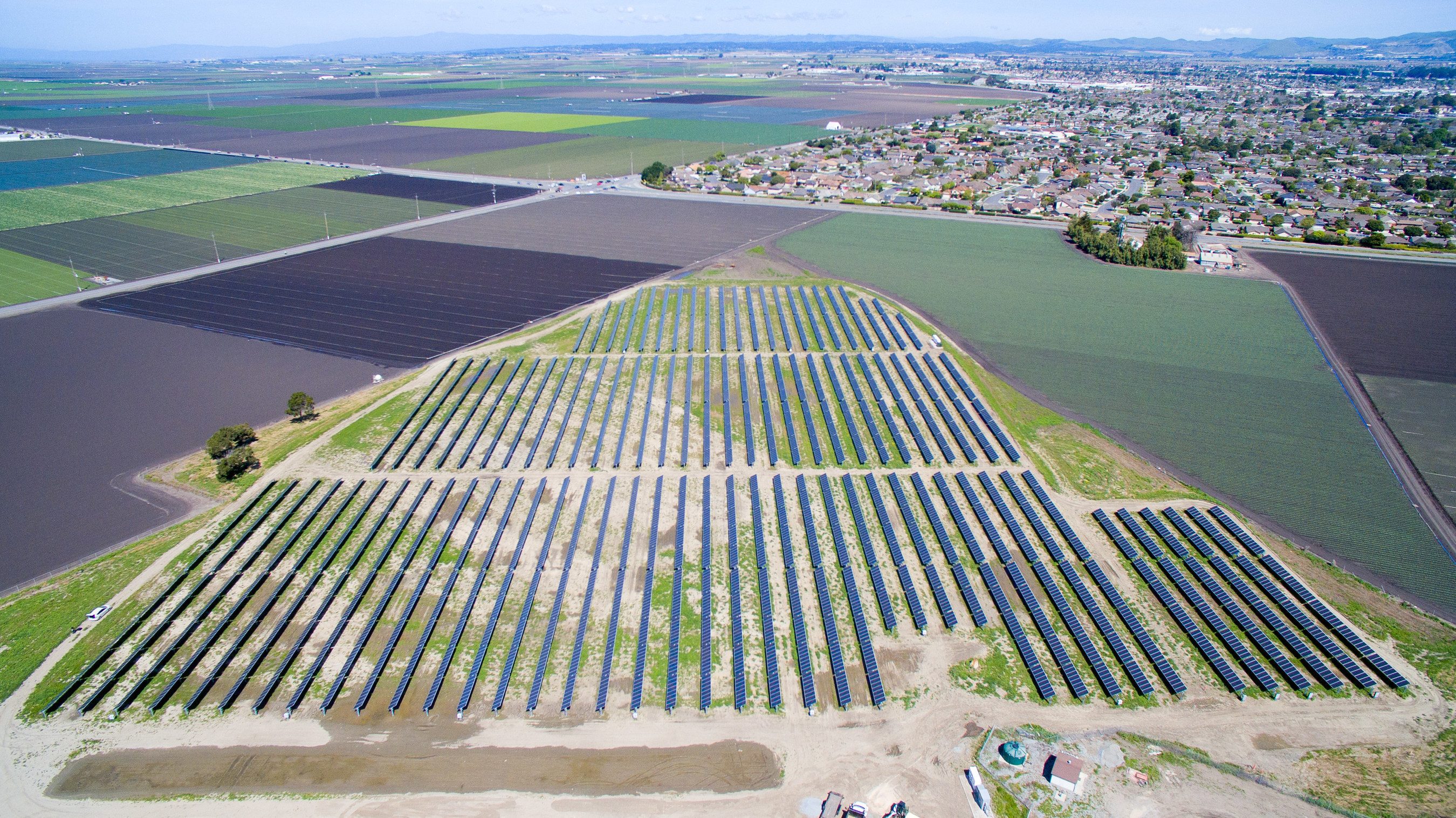 Aerial shot of the City of Salinas' commanding 2MW solar farm, adjacent to the City Animal Services Center in the Salinas Valley. The energy generated by the City's new solar produces the equivalent to the amount needed to power over 375 homes.