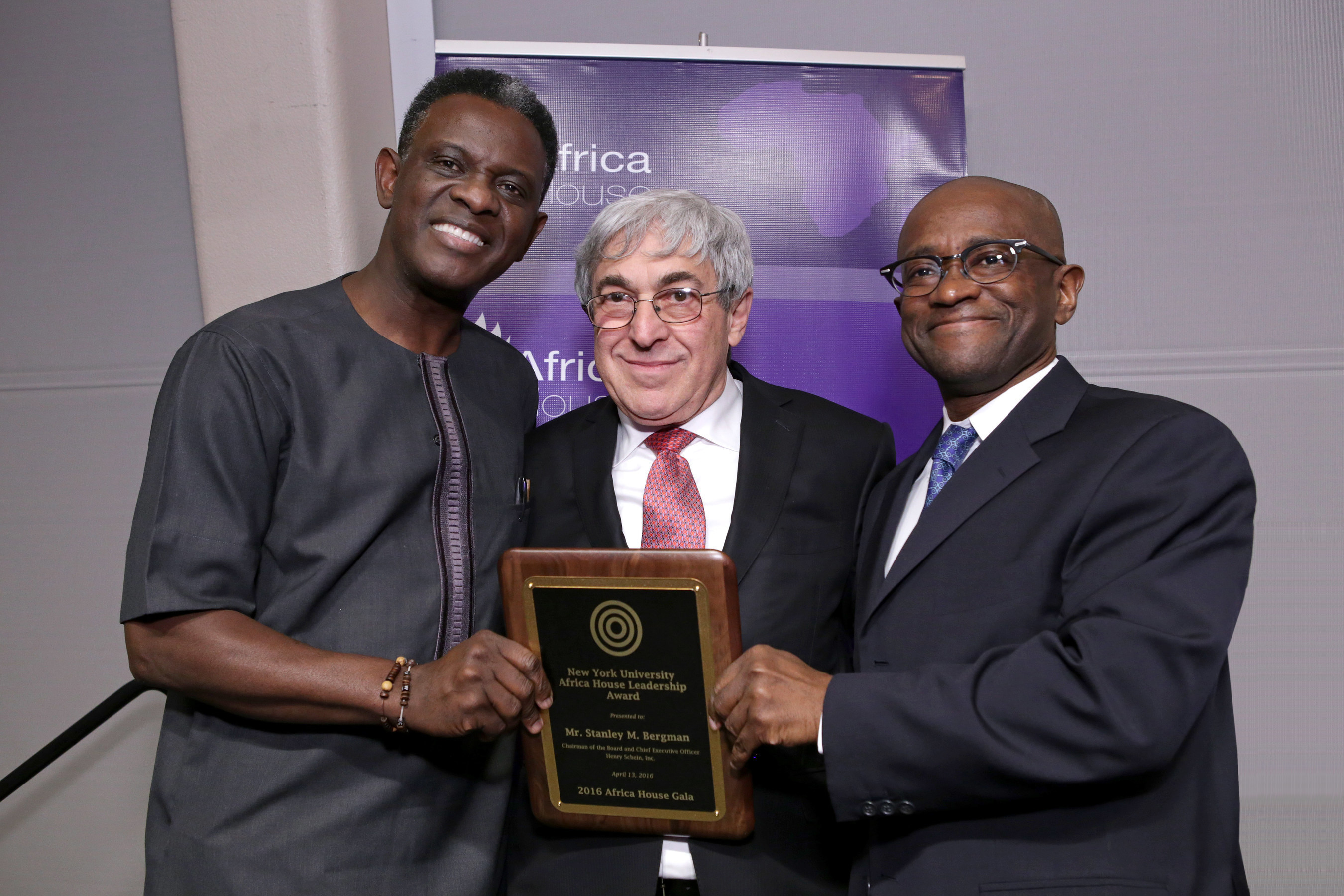 From left is Dr. Gbenga Ogedegbe, MD, MPH, FACP, Professor, Director, Division of Health and Behavior, Department of Population Health, NYU School of Medicine, Vice Dean, NYU College of Global Public Health; Stanley M. Bergman, Chairman of the Board and Chief Executive Officer of Henry Schein, Inc.; and Dr. Yaw Nyarko, Founding Director of Africa House, Director of NYU's Center for Technology and Economic Development, Co-Director of the Development Research Institute, and Professor of Economics at NYU.