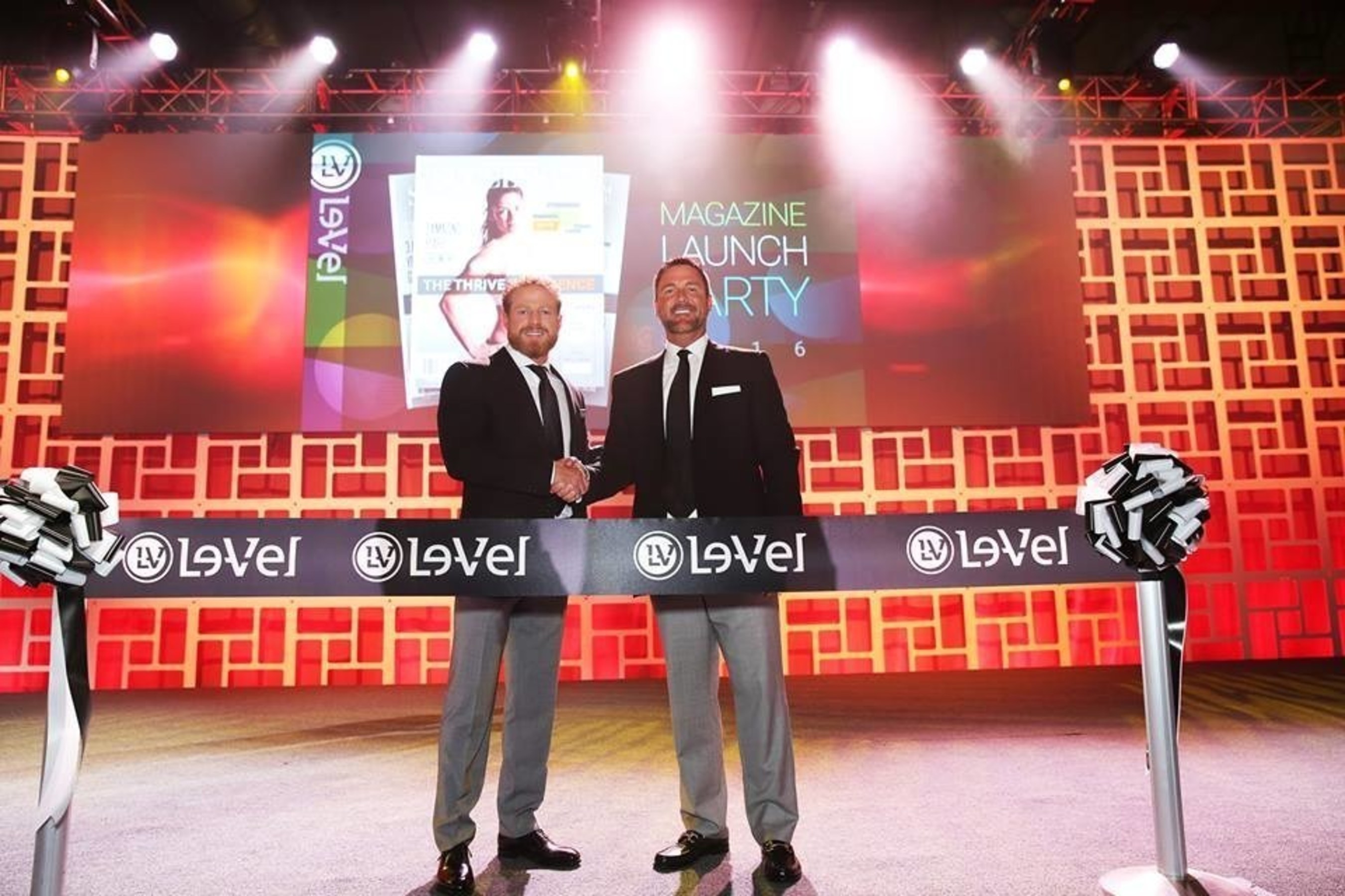 Le-Vel Co-Founders, Co-CEOs and Co-Owners Jason Camper and Paul Gravette take the stage at Le-Vel's SUCCESS FROM HOME magazine launch event held April 29 and 30 at the Gaylord Texan.