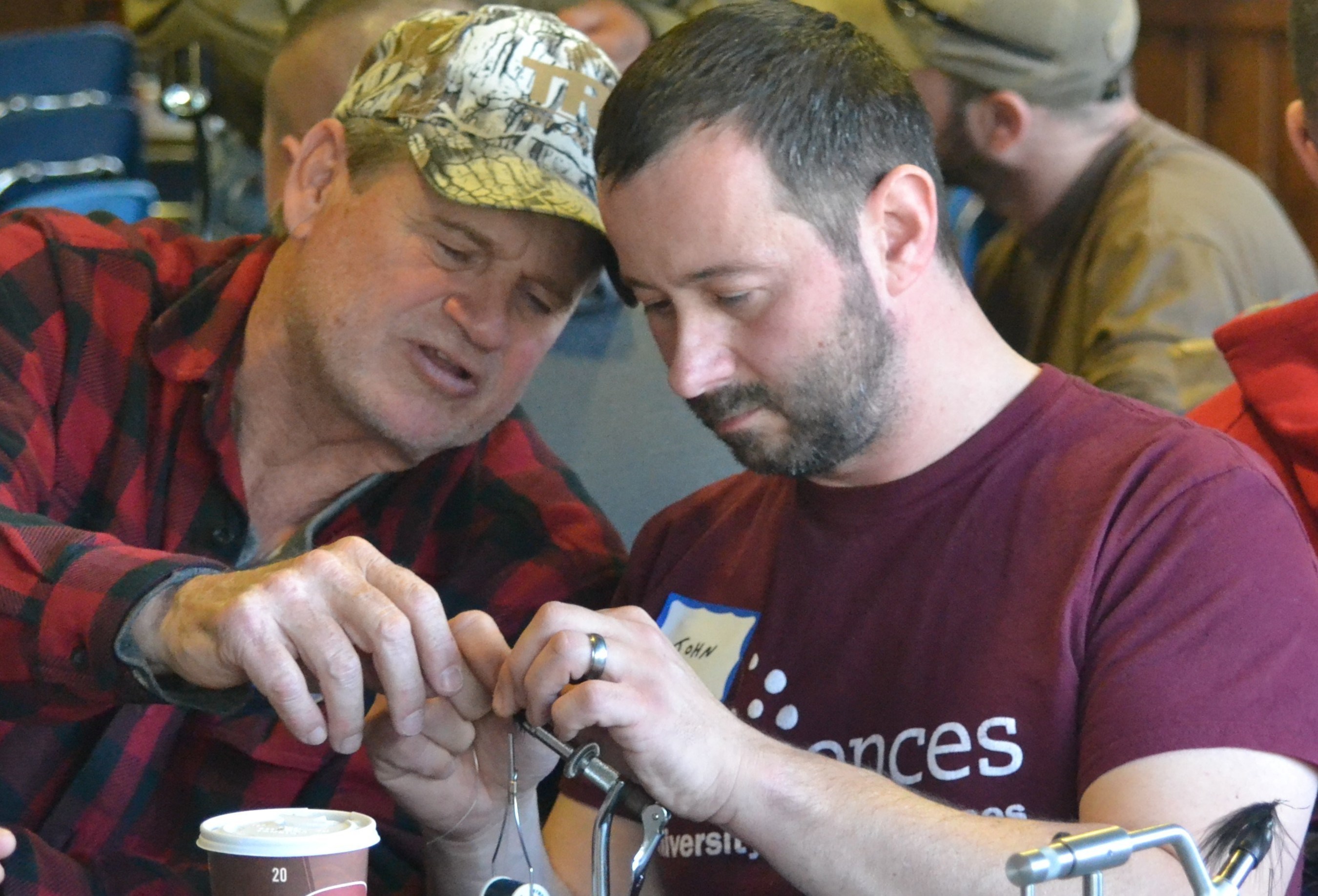 Wounded veterans learn to tie flies at WWP hosted event.
