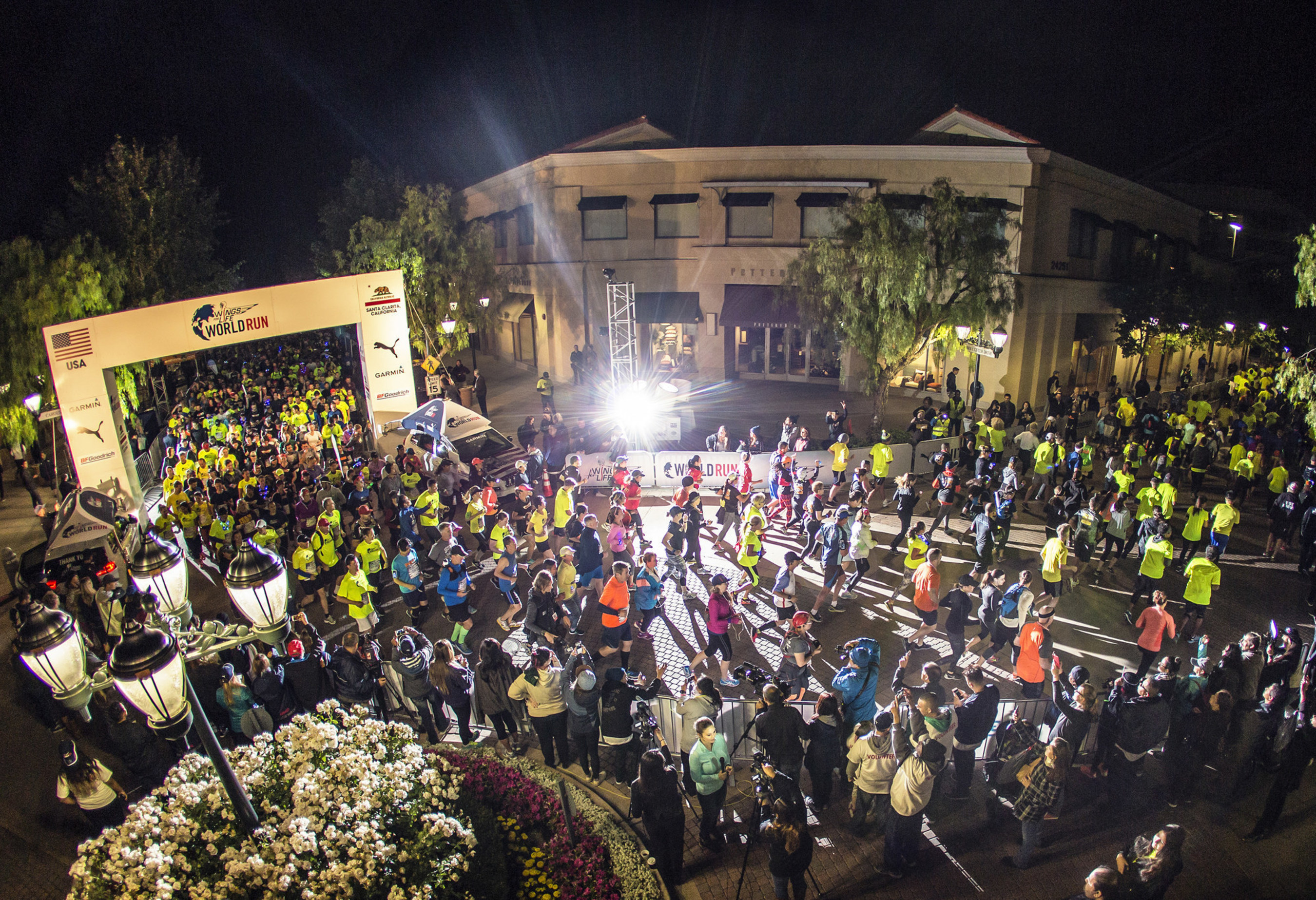 Participants in the Wings for Life World Run take off Sunday morning in Santa Clarita, Calif., one of 34 locations around the world shining a light on spinal cord injury research.