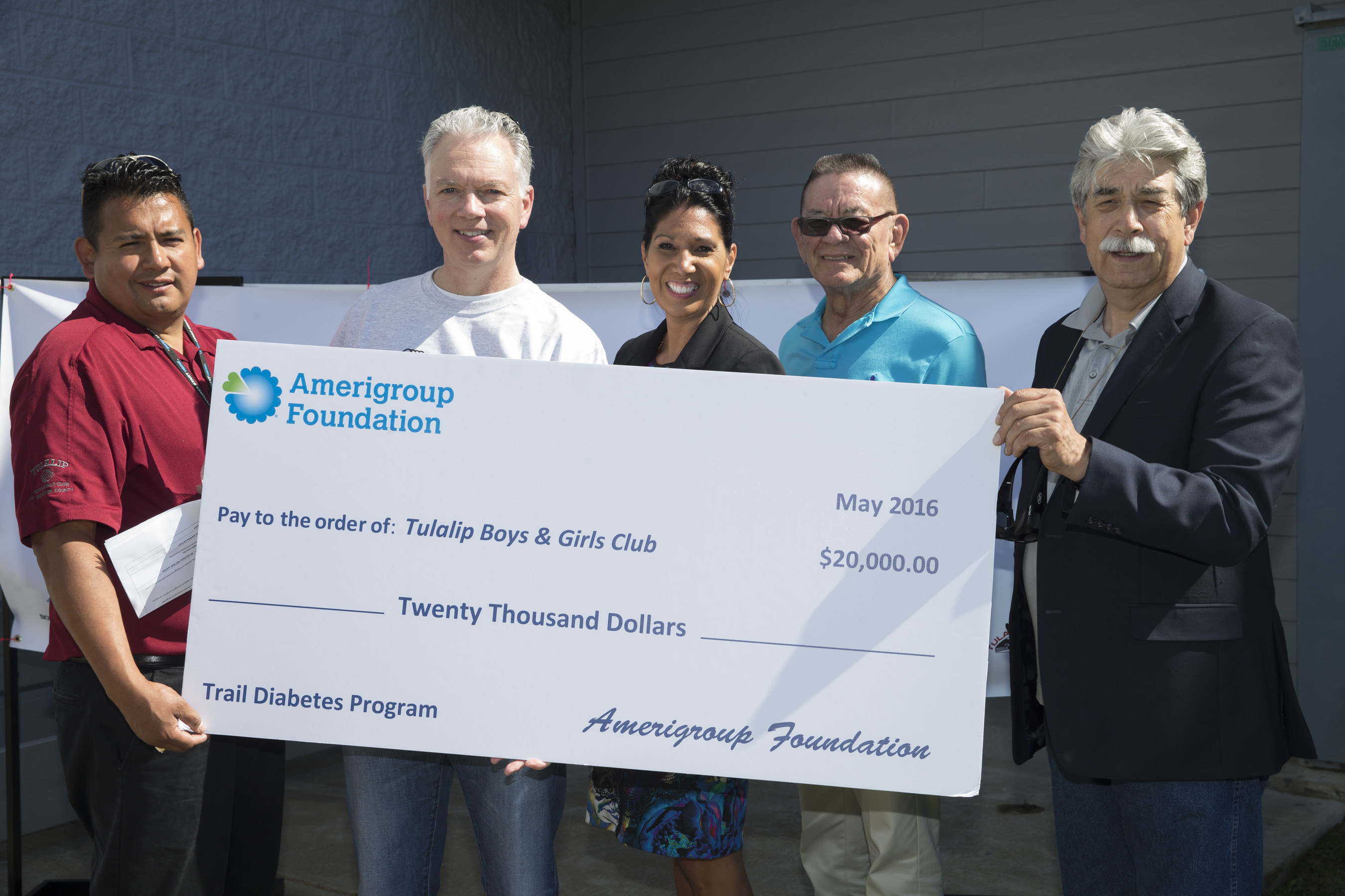 Executives from Amerigroup Foundation present leadership at Boys & Girls Clubs of Snohomish County with a $20,000 grant to support the T.R.A.I.L (Together Raising Awareness for Indian Life) to Diabetes Prevention Program at the Tulalip Club.