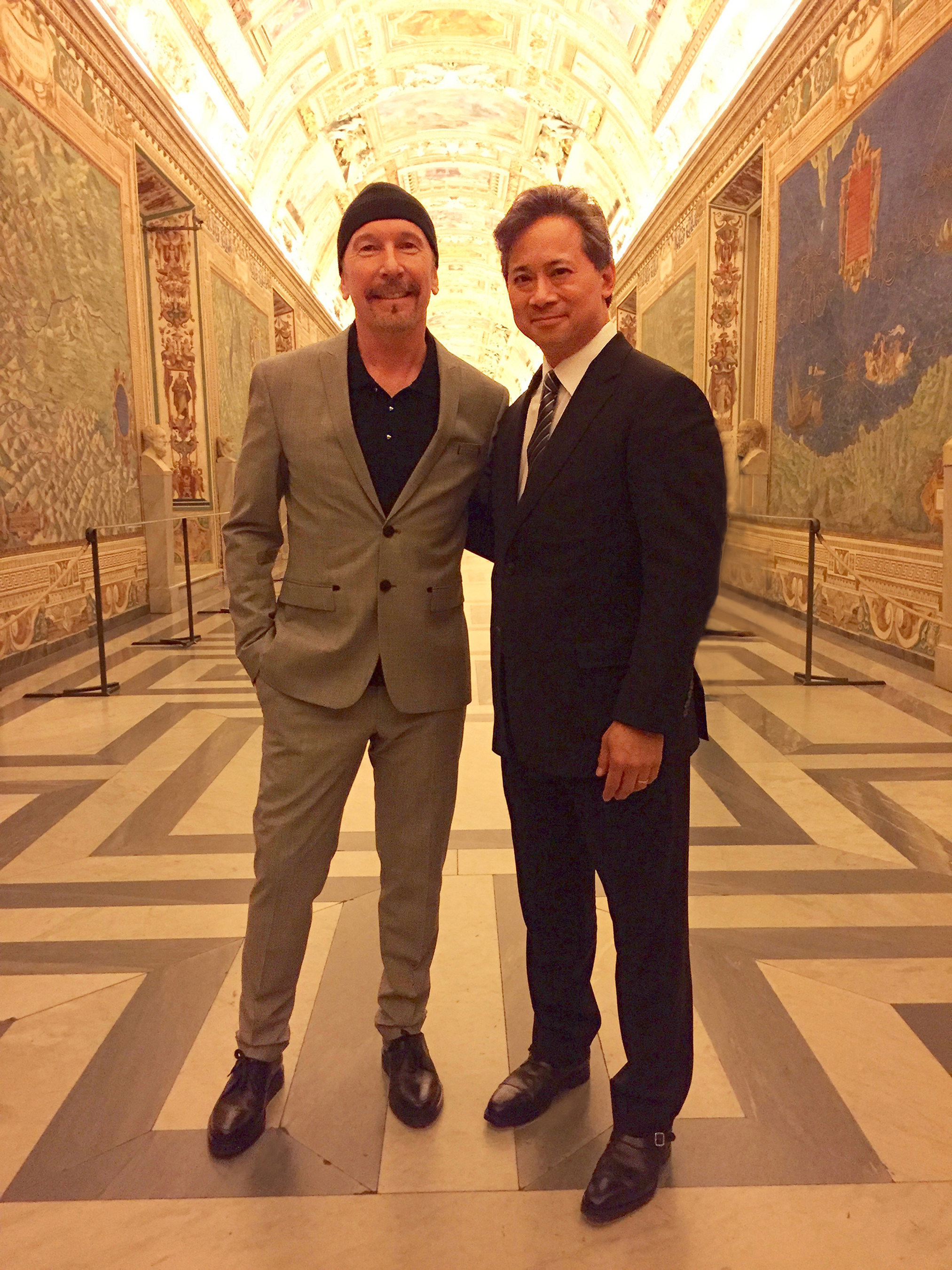 The Edge of U2 and Dr. William Li at the Vatican.