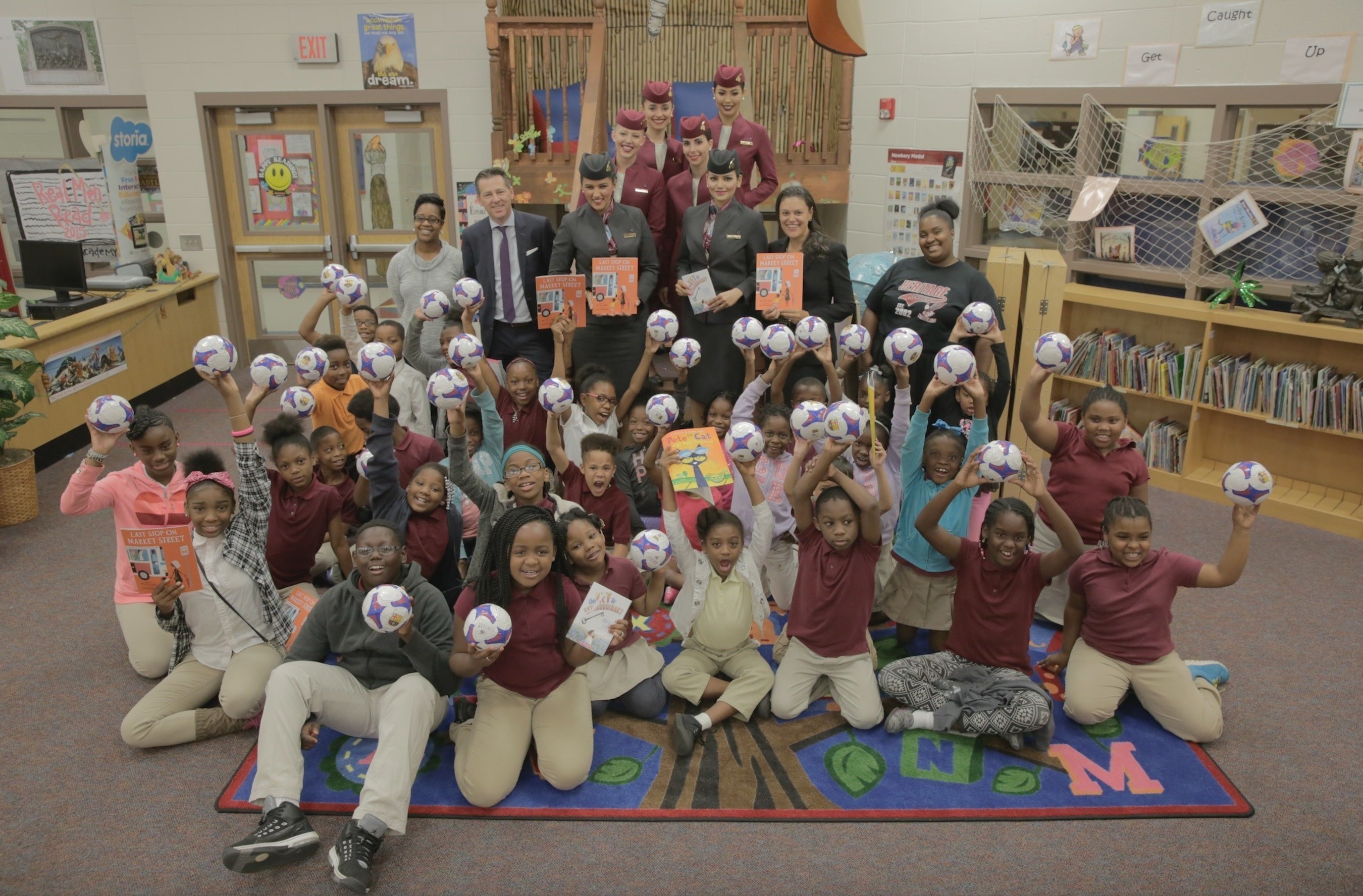 Mr. Gunter Saurwein, Qatar Airways' Vice President of the Americas and Atlanta Public Schools Superintendent, Dr. Meria Carstarphen alongside the students and faculty of Heritage Academy Elementary School