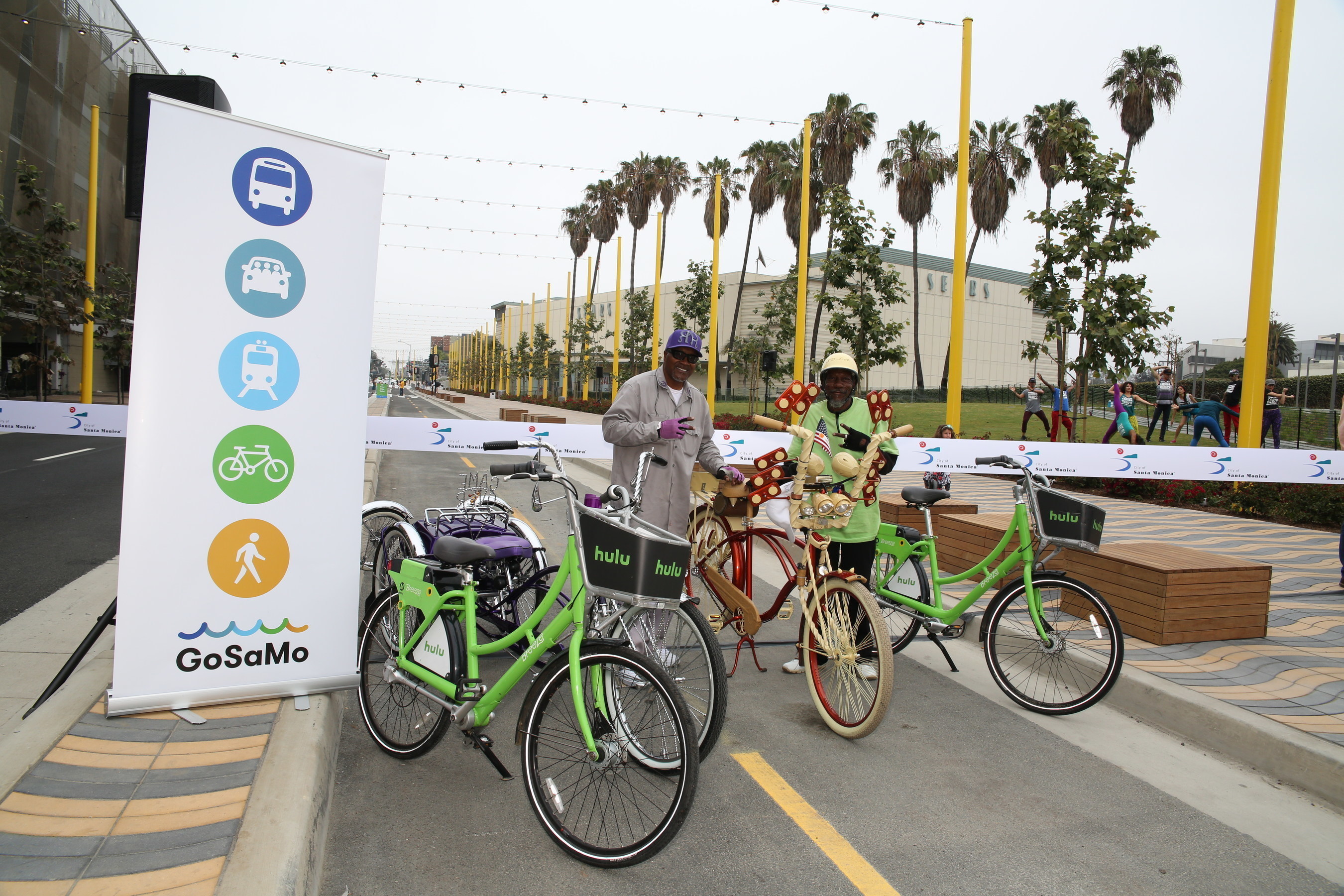 Two participants show off their custom bikes at the Colorado Esplanade opening just before the kickoff of Coast 2016 alongside Santa Monica's Breeze Bike Share. Santa Monica, California. June 5, 2016. Photographer: Kristina Sado