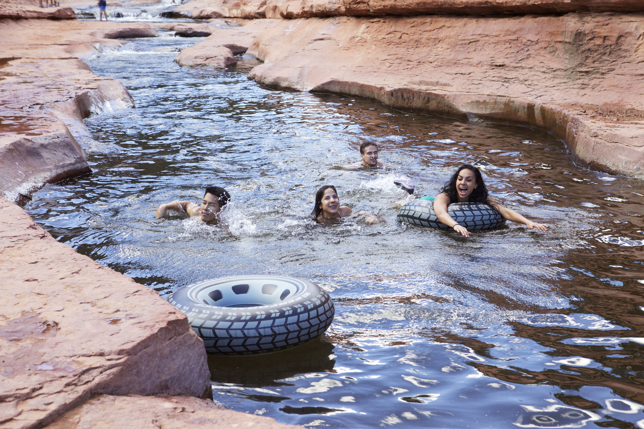 SlideRock AZ - Swimmers float along Arizona's Slide