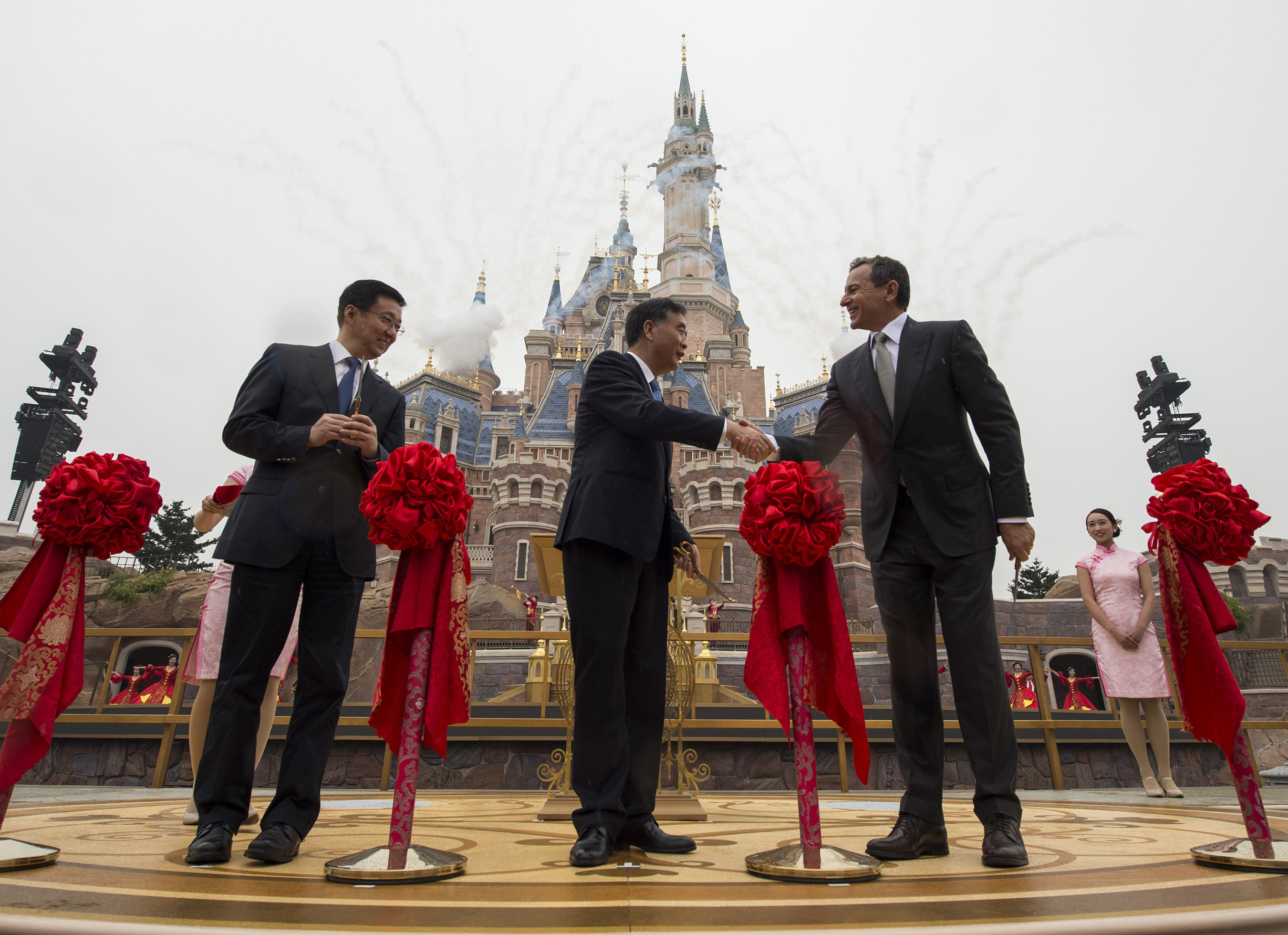 Thousands of invited guests celebrated the Grand Opening of Shanghai Disney Resort today with the help of a flood of Shanghai Disney cast members and Disney character friends at a dedication ceremony. Bob Iger, chairman and CEO of The Walt Disney Company (right) joined Chinese CPC Politburo members Wang Yang, State Council Vice Premier (middle), and Han Zheng, Party Secretary of Shanghai (left), to officially open the resort's new theme park, Shanghai Disneyland, at the iconic Enchanted Storybook Castle.