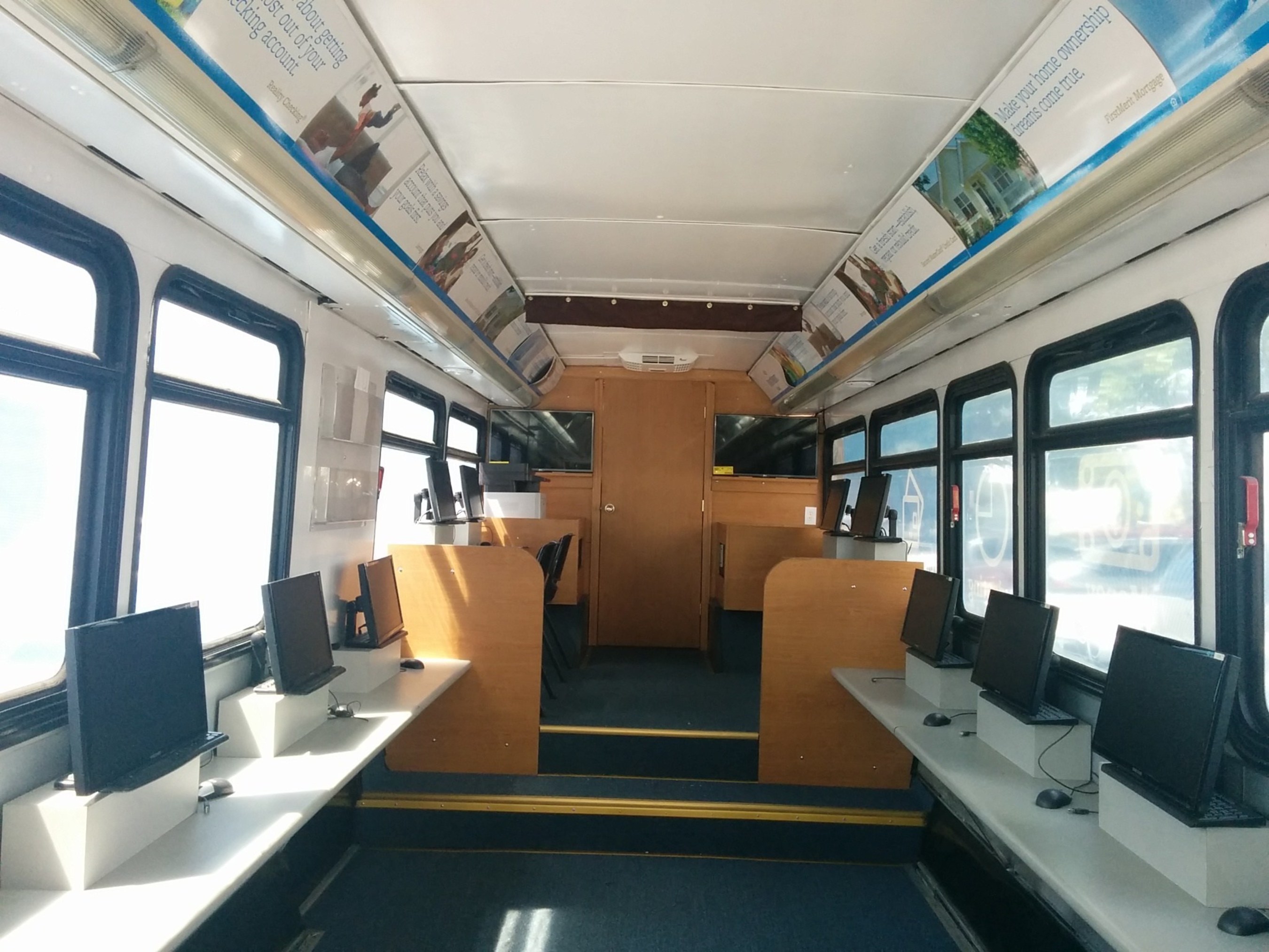 The interior of FirstMerit's Mobile Financial Learning Center is equipped with computer workspaces and other resources for teaching individuals how to take control of their financial future.