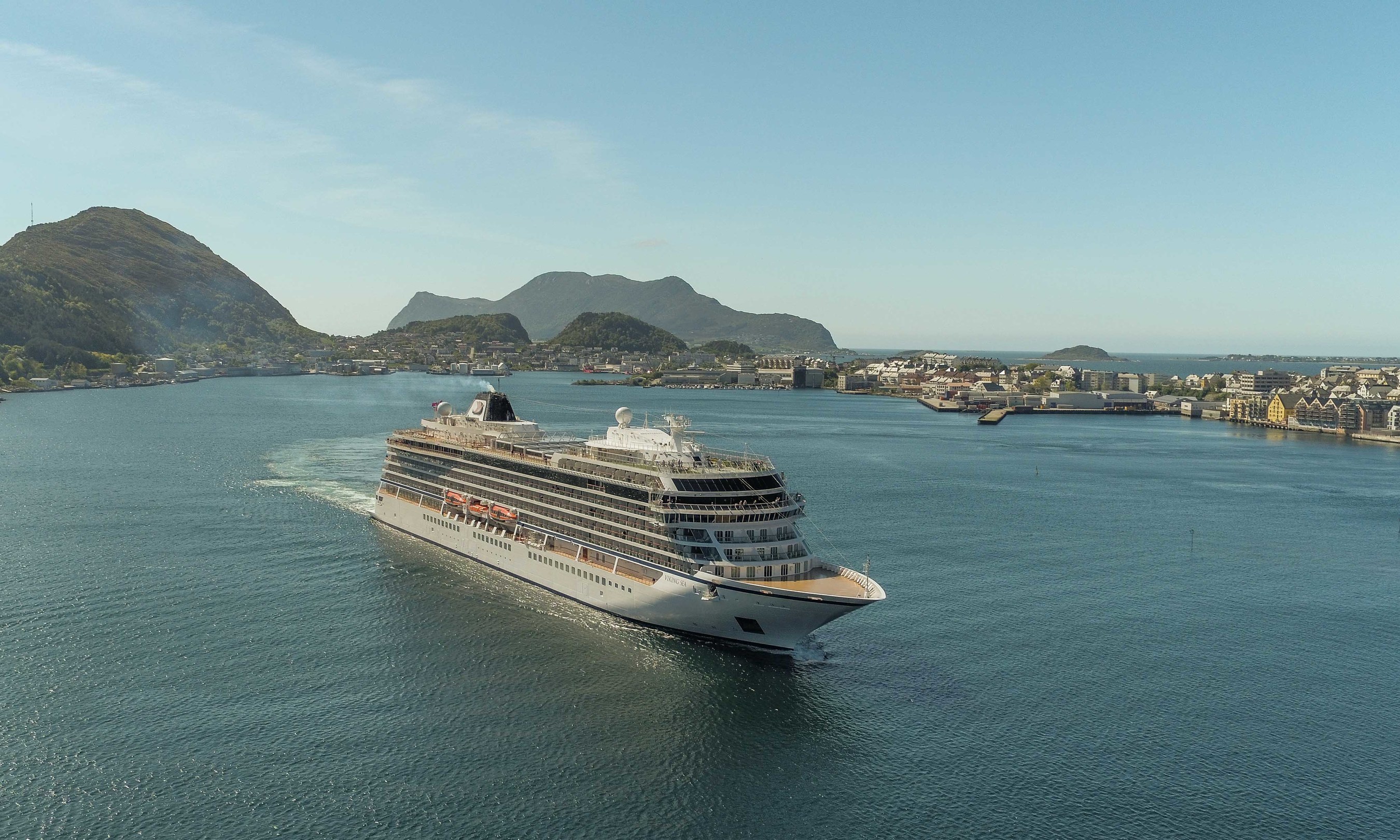 The new 930-passenger Viking Sea cruises into Alesund, Norway on the first sailing of the Viking's new "Into the Midnight Sun" itinerary that operates between London and Bergen, Norway.