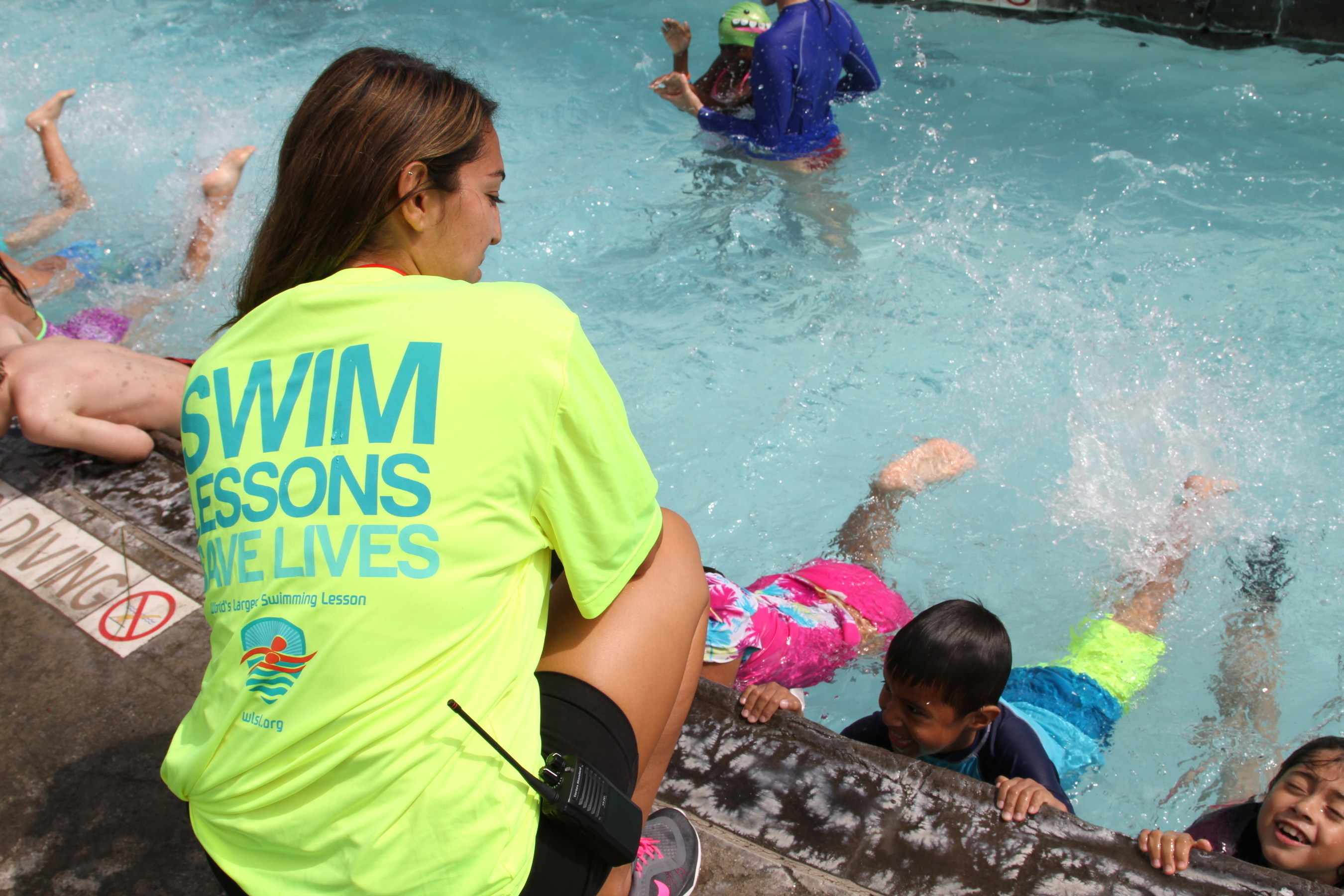 Supervising Lifeguard, Nicole Alvarado instructs swimmers during The 2016 World's Largest Swimming Lesson at Splash La Mirada outside of Los Angeles. More than 45,000 swimmers in 24 countries joined forces to help send the message Swimming Lessons Save Lives to help prevent drowning, the second leading cause of accidental death for kids ages 1-14. More drowning and near-drowning accidents take place in June than any other month of the year.