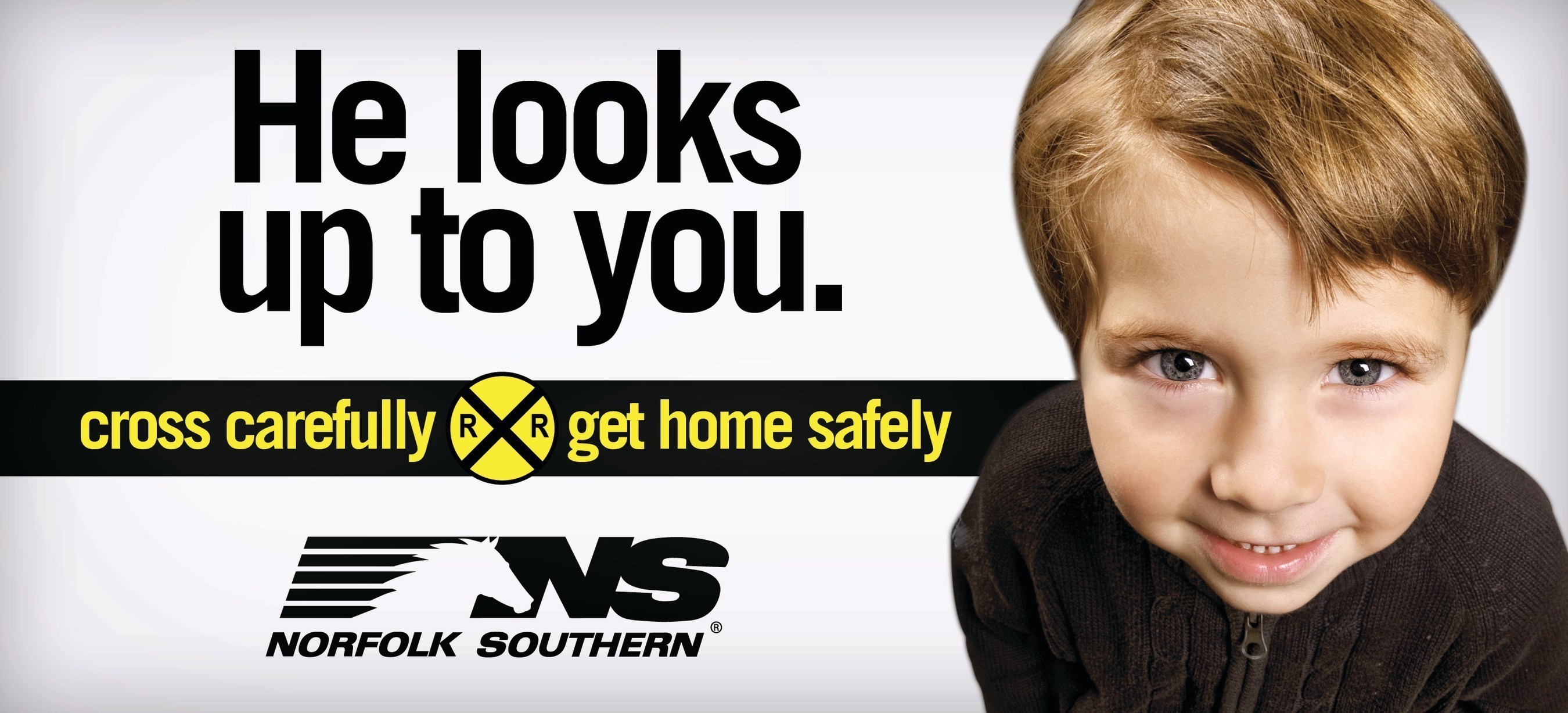 Billboards remind Indiana residents to cross railroad tracks carefully and return home safely.