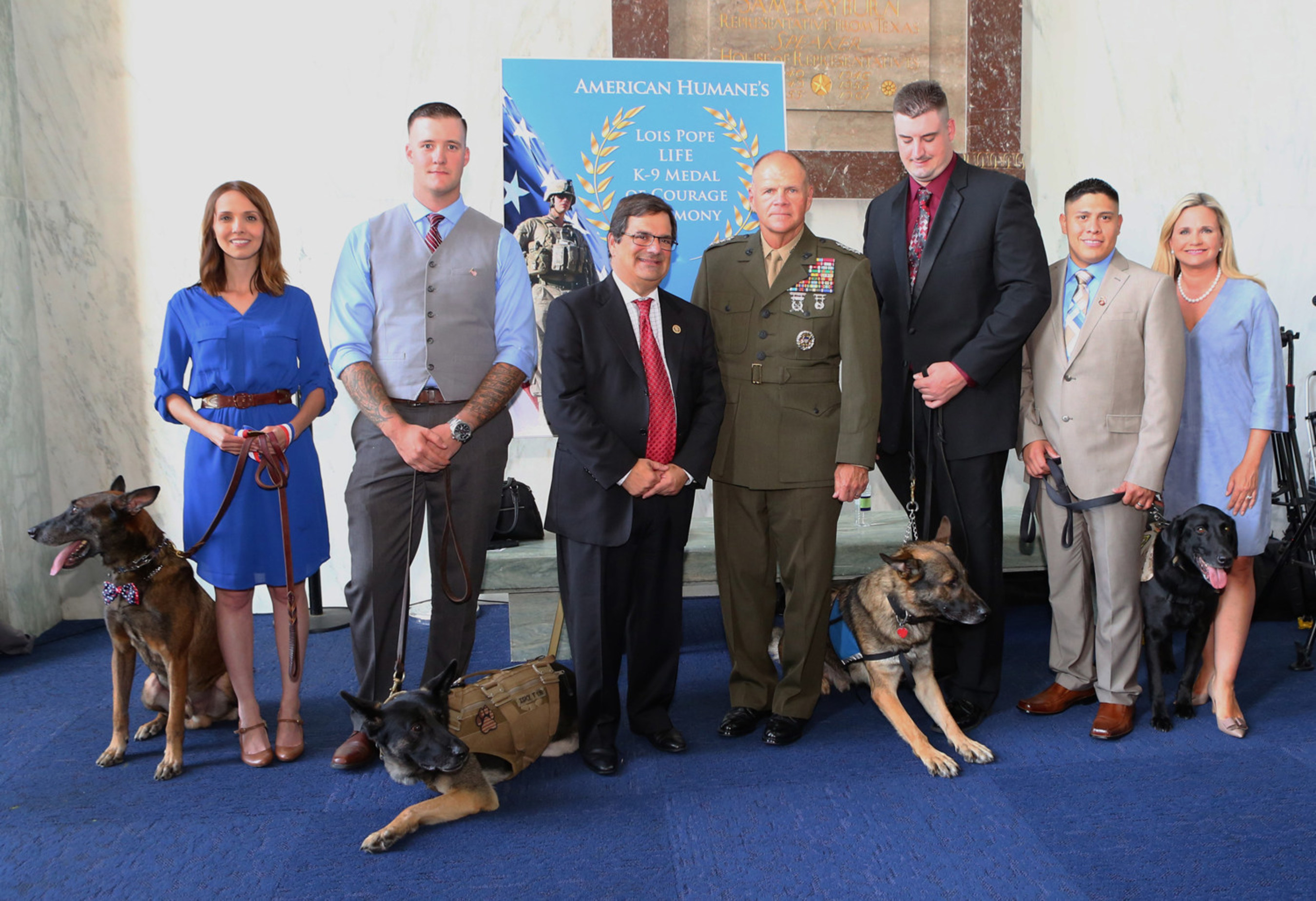 HONORING OUR K9 MILITARY HEROES (left to right): MWD Bond, Sarah Browning, Sgt. Wess Brown, MWD Isky, Congressman Gus Bilirakis, General Robert B. Neller, MWD Matty, Spc. Brent Grommet, Corp. Nick Caceres, CWD Fieldy, American Humane President Dr. Robin Ganzert
