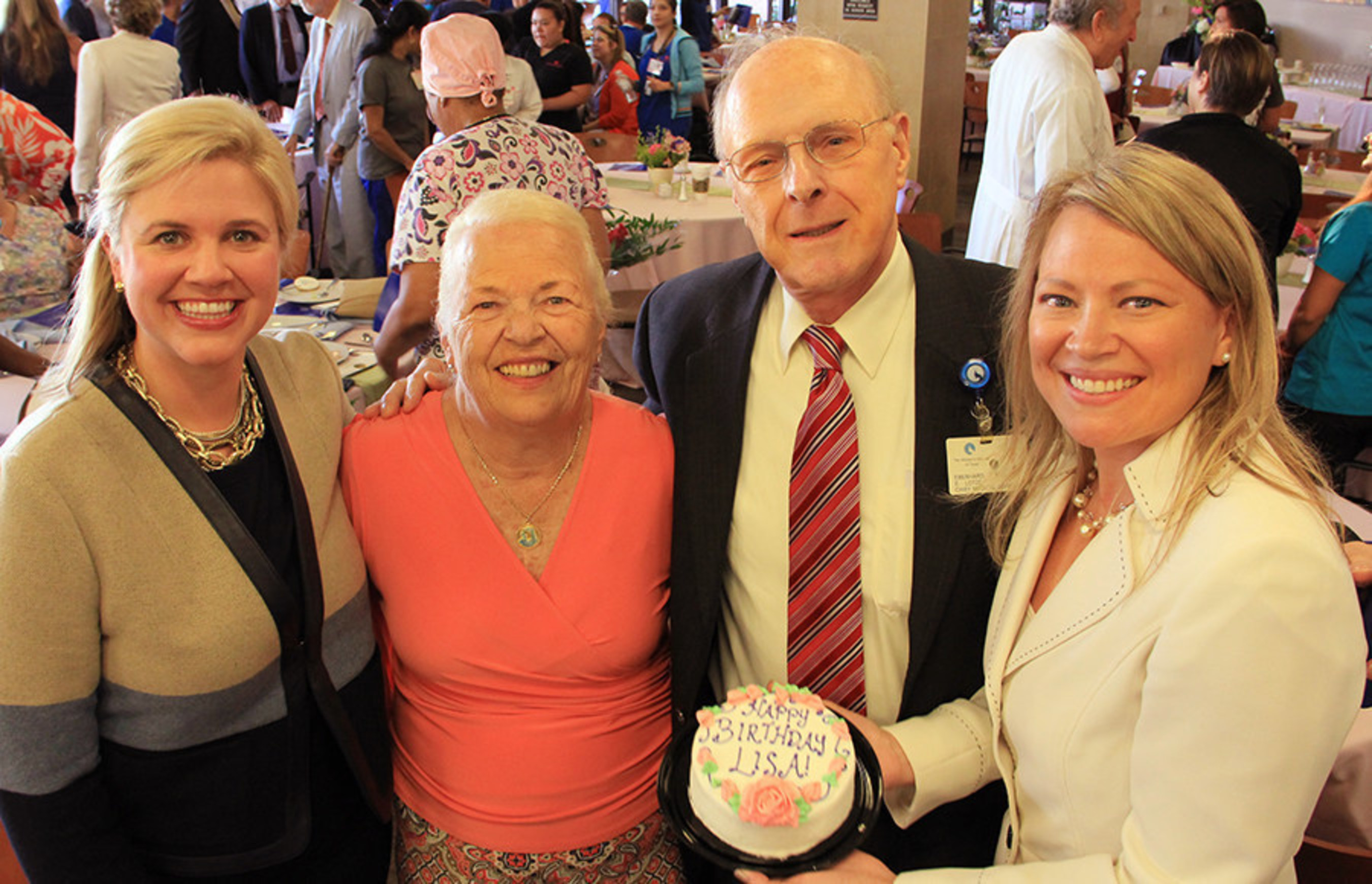 (Left to Right) The Woman's Hospital of Texas CEO Ashley McClellan celebrates the hospital's 40th anniversary with Ann Wagner, one of the first patients to deliver her baby, Lisa Woods, on opening day, Dr. Eberhard Lotze, Ms. Wagner's obstetrician and a hospital founder, and Lisa Woods.