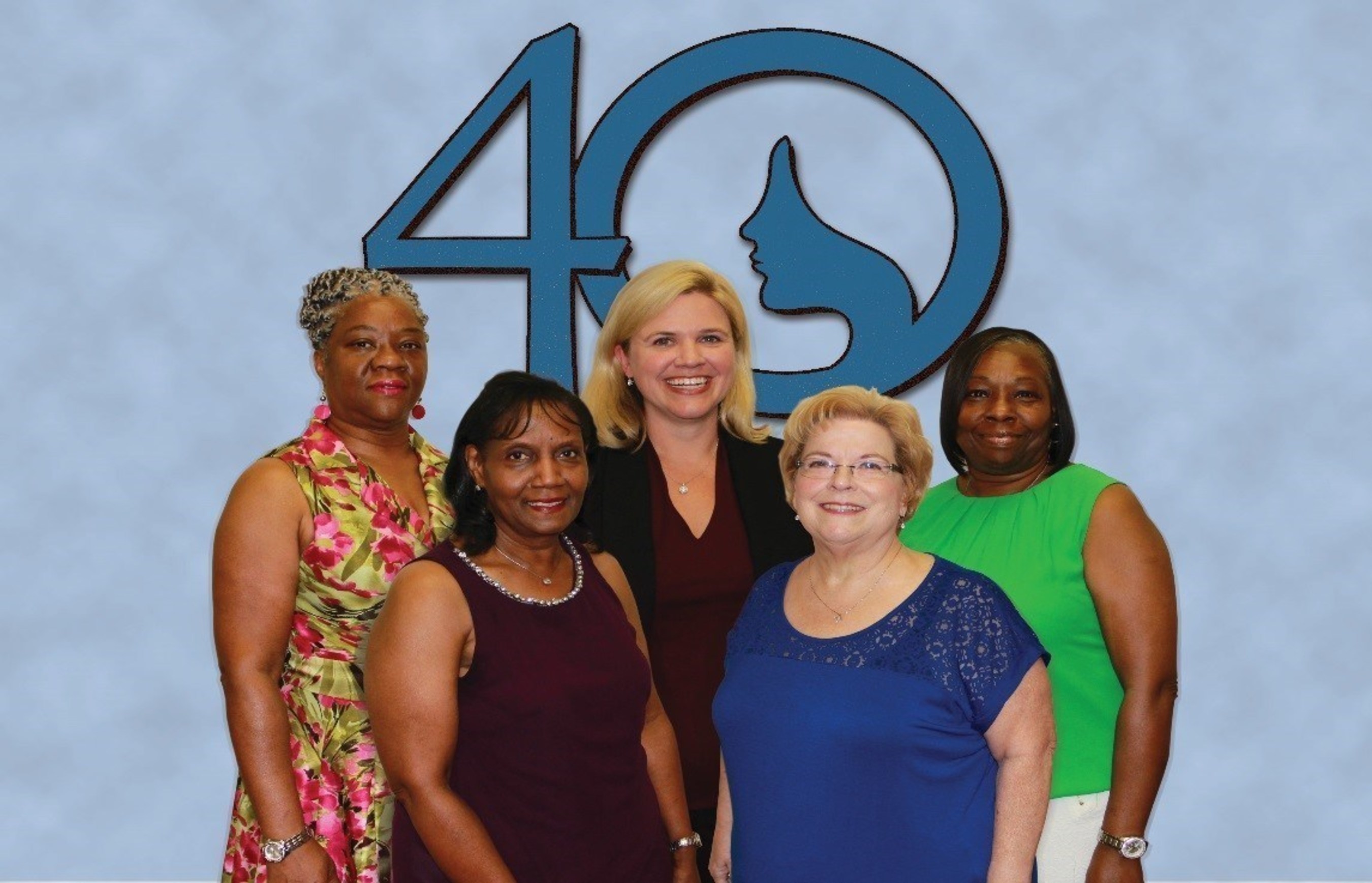 (Back Row, Left to Right) Surgical Technician Bobbie Hall Brown Hall, CEO Ashley McClellan, Labor and Delivery Unit Secretary Katherine Howard, (Front Row, Left To Right) Pre Surgical Testing Nurse Linda Washington, and Operating Room Nurse Carla Tehranchi of The Woman's Hospital of Texas. Ashley McClellan congratulates staff that began their careers at The Woman's Hospital of Texas 40 years ago.