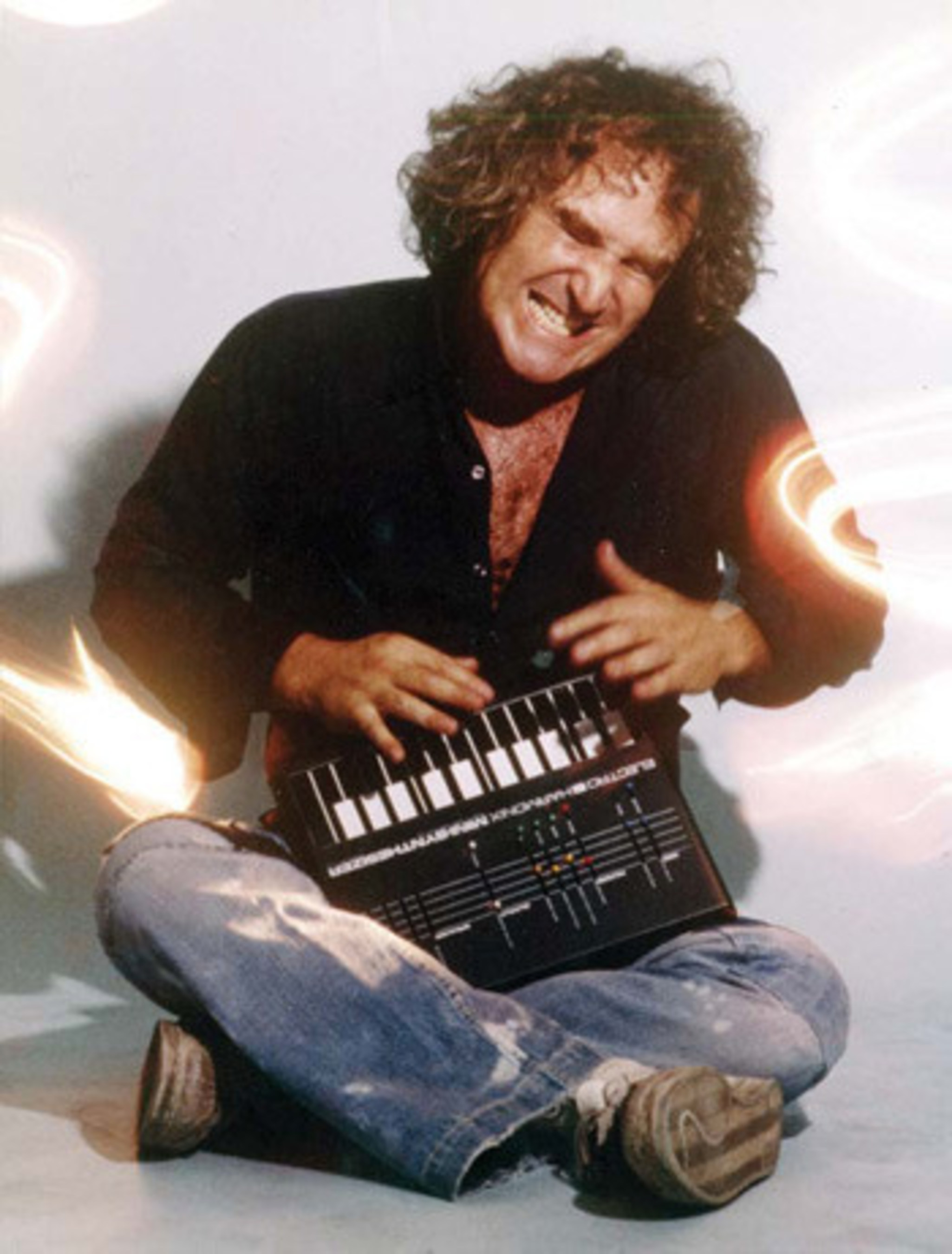 Mike Matthews, Electro-Harmonix President and Founder, pictured with an original Mini-Synthesizer circa 1980. Electro-Harmonix has released a mobile app version of this early electronic synthesizer keyboard.