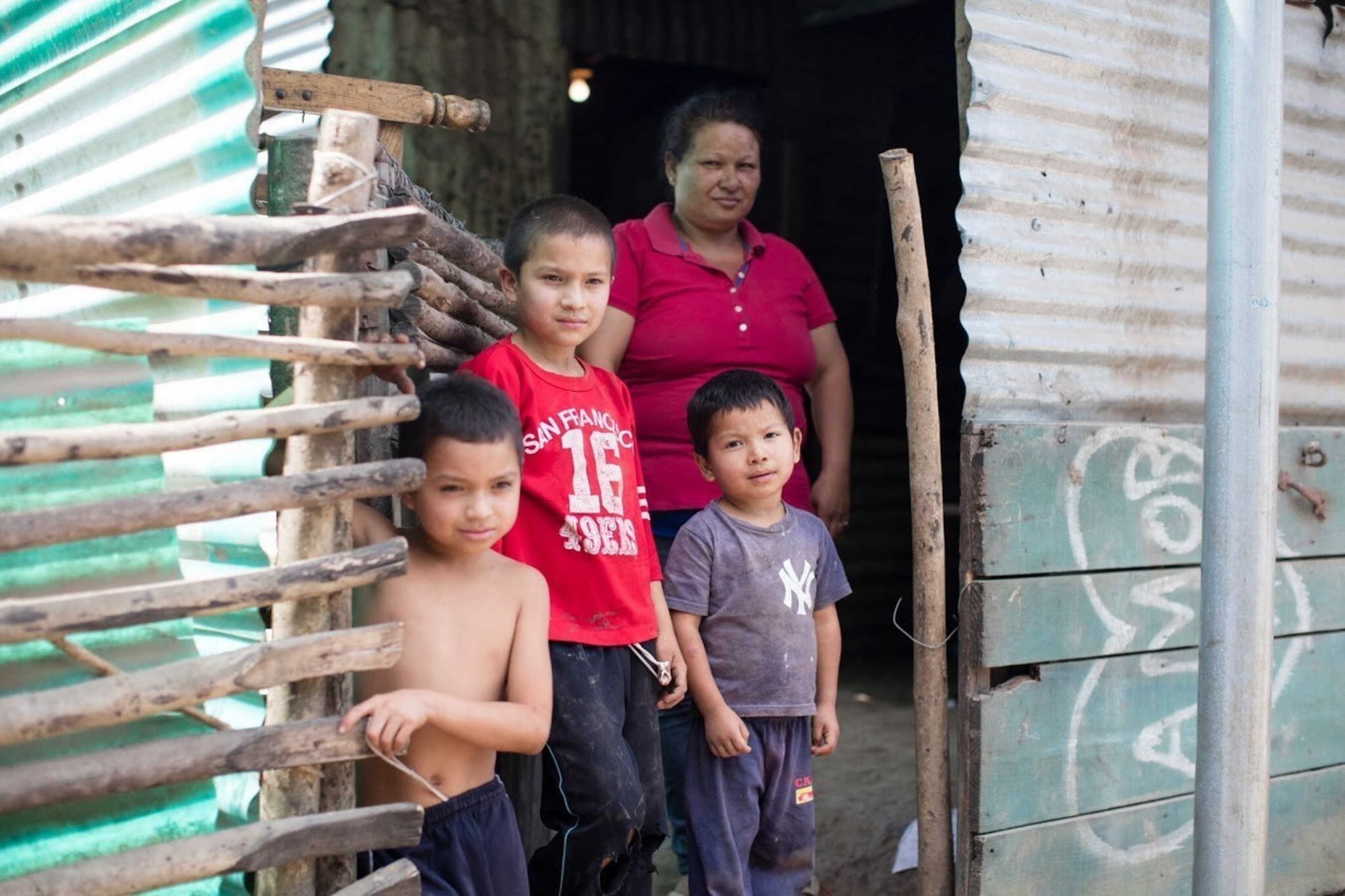 One of the countless families in Ahuachapan, El Salvador living in a rural shack slum.