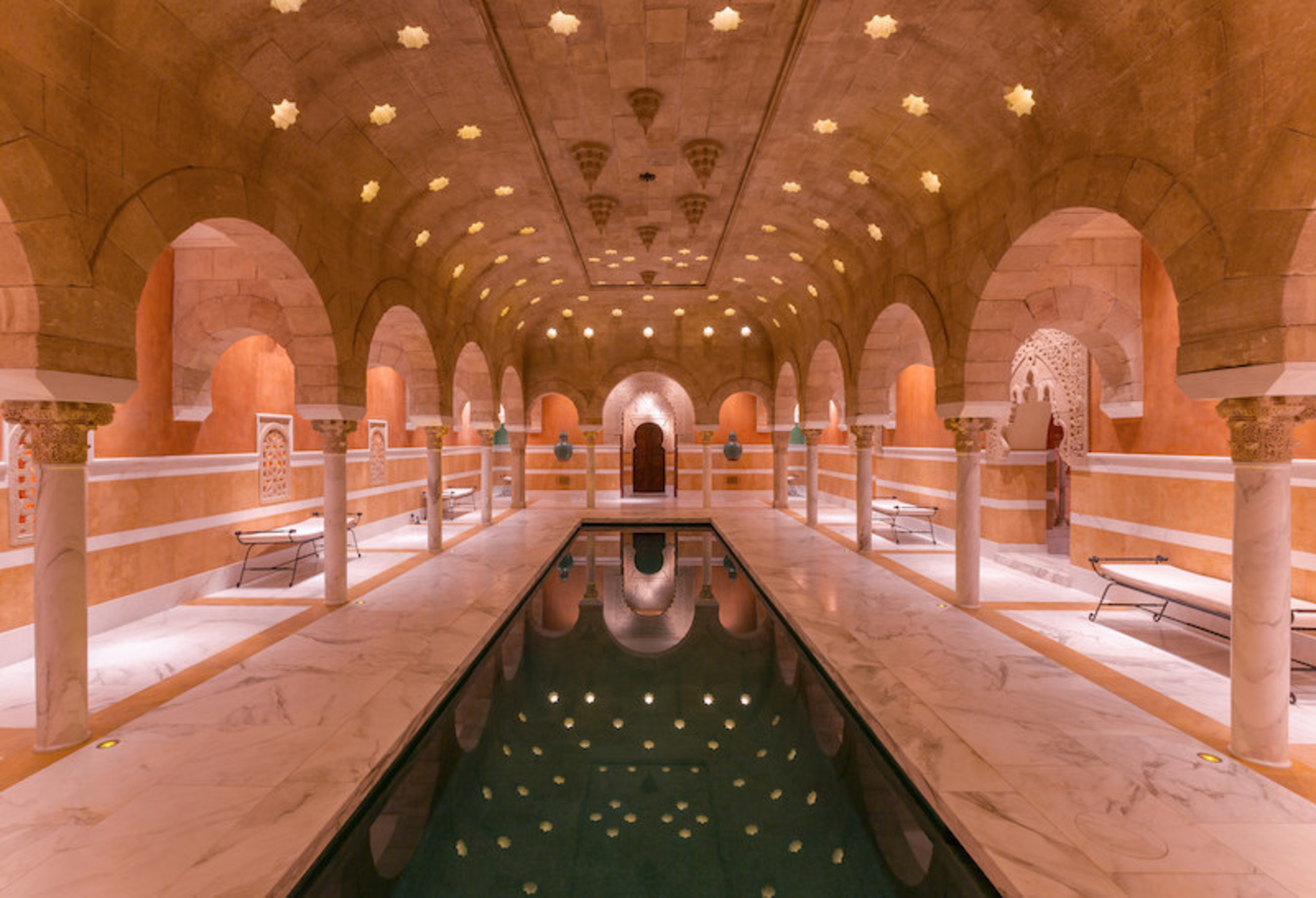 Hacienda de la Paz 10th century Moorish hamam spa indoor pool with sandstone ceiling and lights