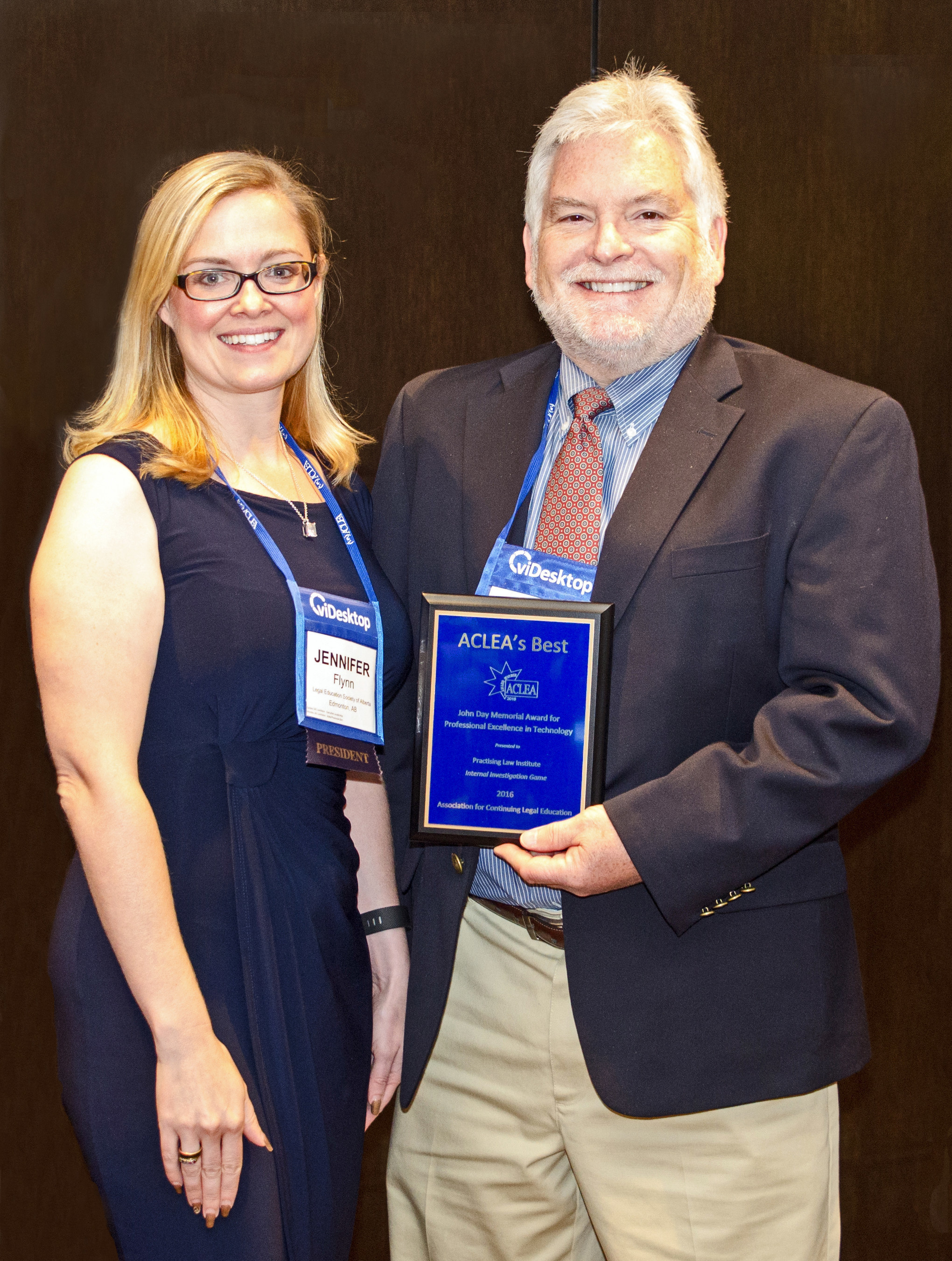 ACLEA President, Jennifer Flynn presents Dr. JC Kinnamon, Director of the Office of Research and Development at the Practising Law Institute, with the Outstanding Achievement in Technology Award at the Association for Continuing Legal Education (ACLEA) meeting in Seattle on August 2.