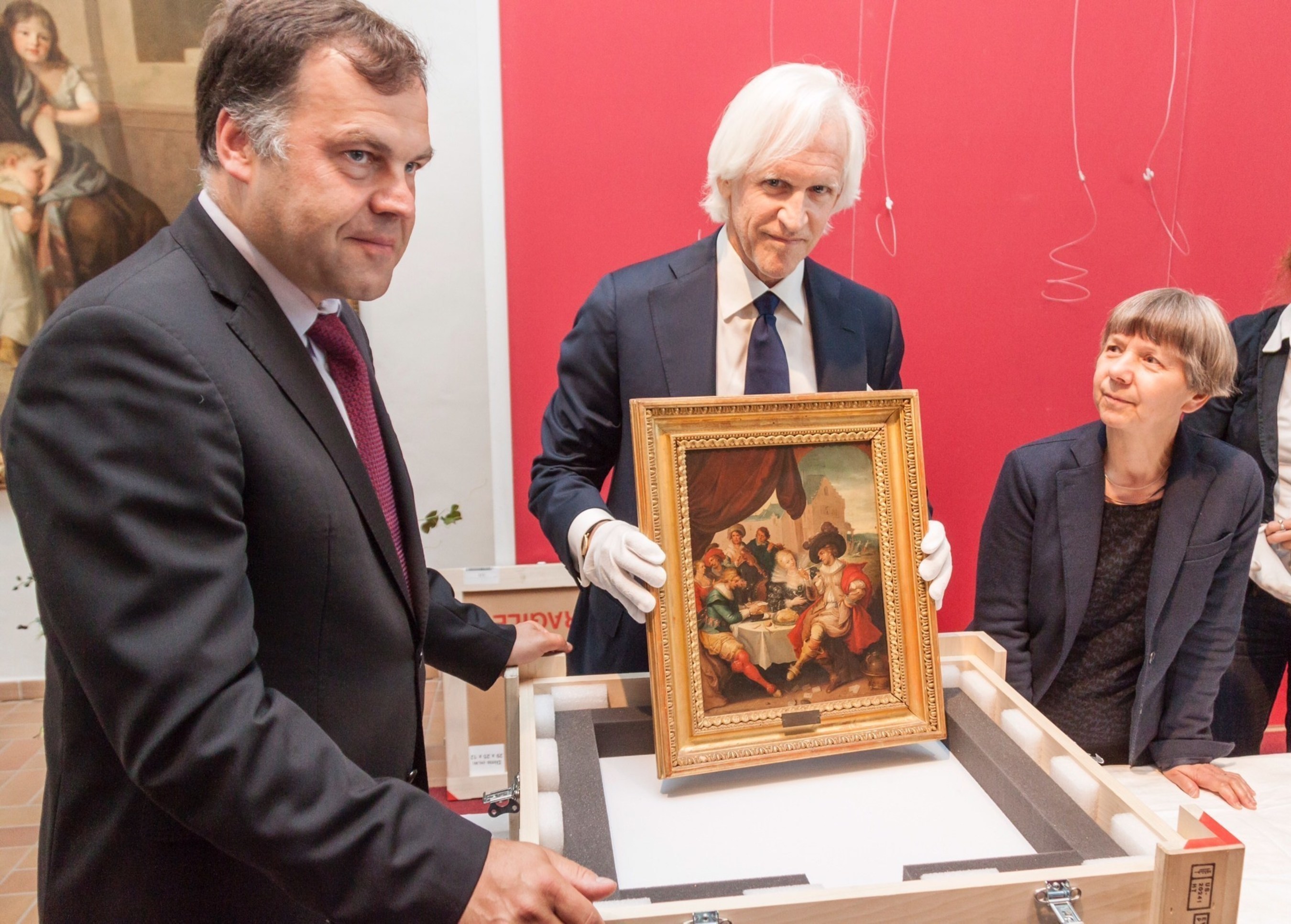 Robert M. Edsel, Founder and Chairman of the Monuments Men Foundation for the Preservation of Art, holds one of five paintings the Monuments Men Foundation discovered and turned over to the Federal Republic of Germany in 2015 for return to their rightful owners. These paintings are part of the hundreds of thousands of cultural items, missing since the end of the war, which the Monuments Men Foundation hopes to help recover in the coming years.