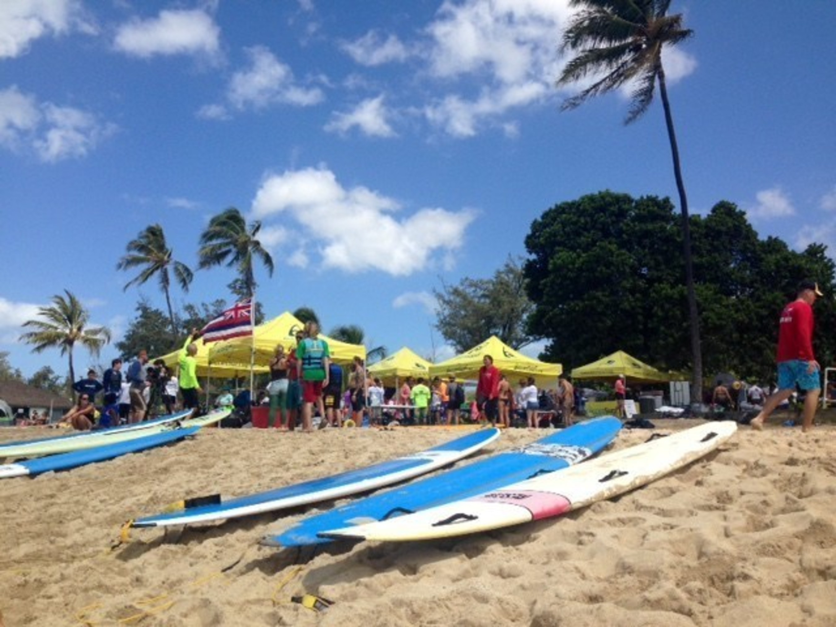 Injured veterans recently enjoyed water activities including adaptive surfing, shoreline flotation, and swimming at a volunteer event with Wounded Warrior Project in Ewa Beach, Hawaii.
