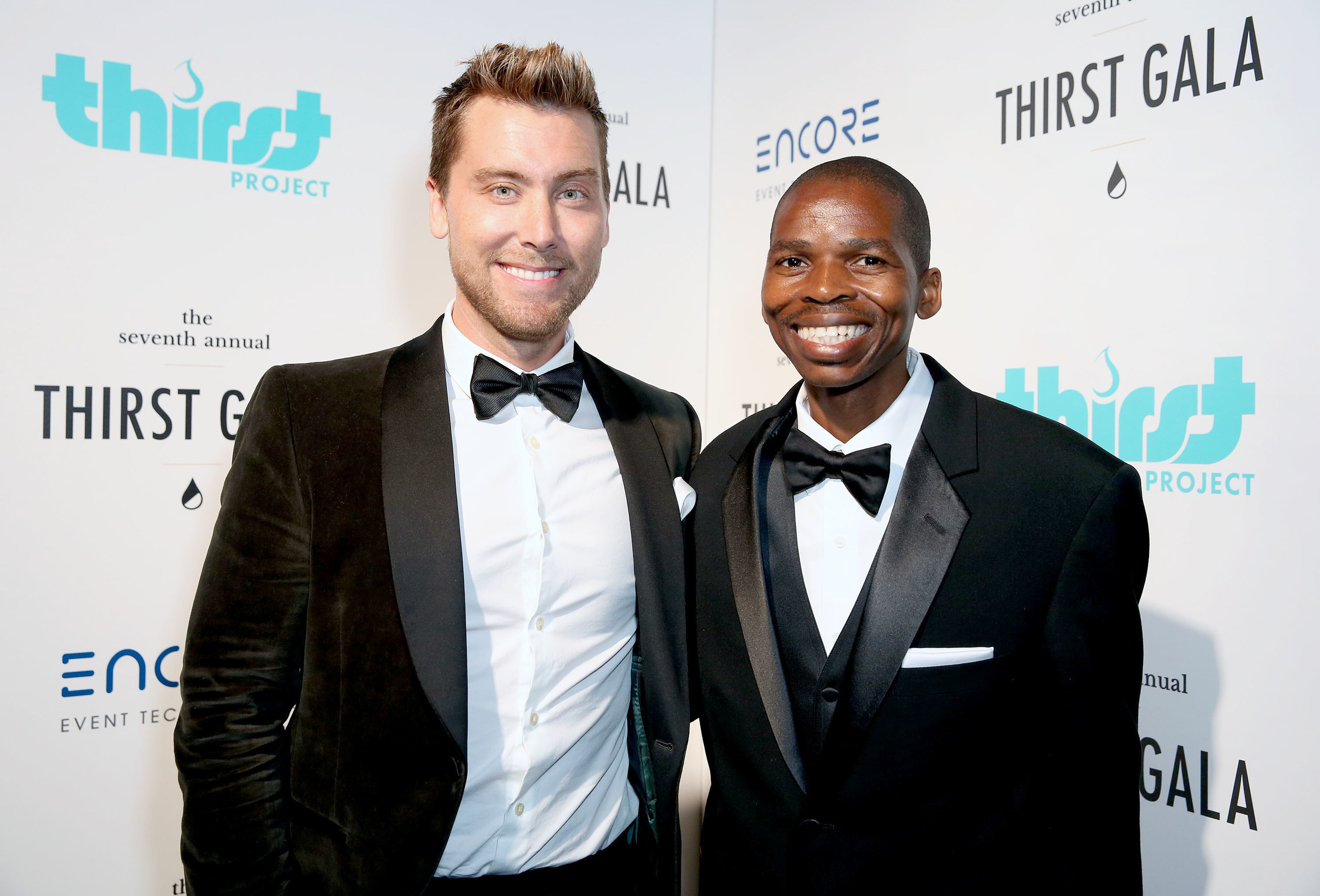 (photo courtesy of ThirstProject.Org) MENAJI Men's Skincare supported Lance Bass and Sibusiso Shiba backstage during the 7th Annual Thirst Gala at The Beverly Hilton Hotel on June 13, 2016 in Beverly Hills, California.