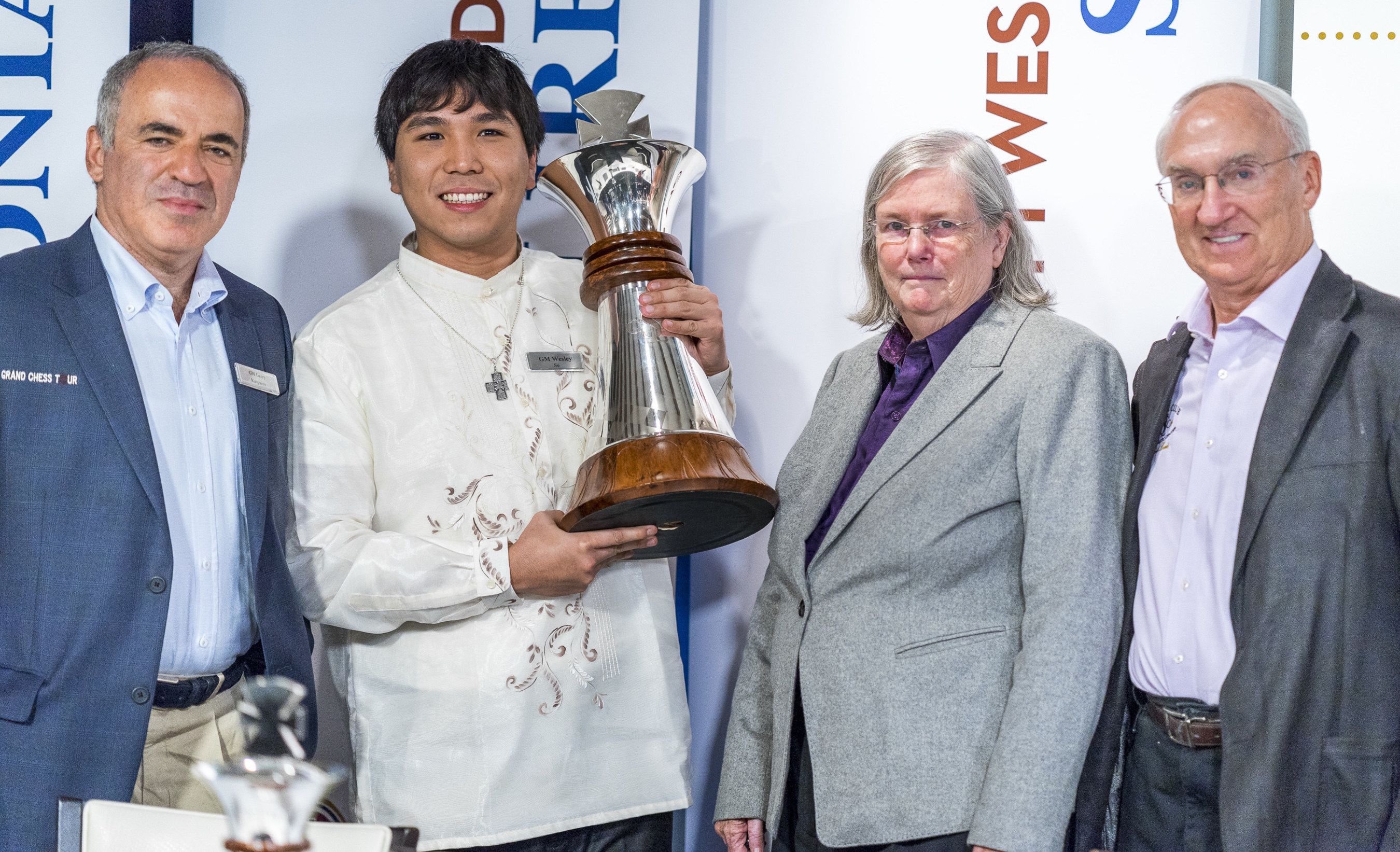 Grandmaster Garry Kasparov (left) and Dr. Jeanne and Rex Sinquefield, founders of the Chess Club and Scholastic Center of Saint Louis (right) present American Grandmaster Wesley So (center) with the Sinquefield Cup champion's trophy at the tournament's Closing Ceremony Aug. 15. The Sinquefield Cup tournament was held at the Chess Club and Scholastic Center of Saint Louis, and is the third of four stops - and the sole U.S. stop - on the international Grand Chess Tour circuit.