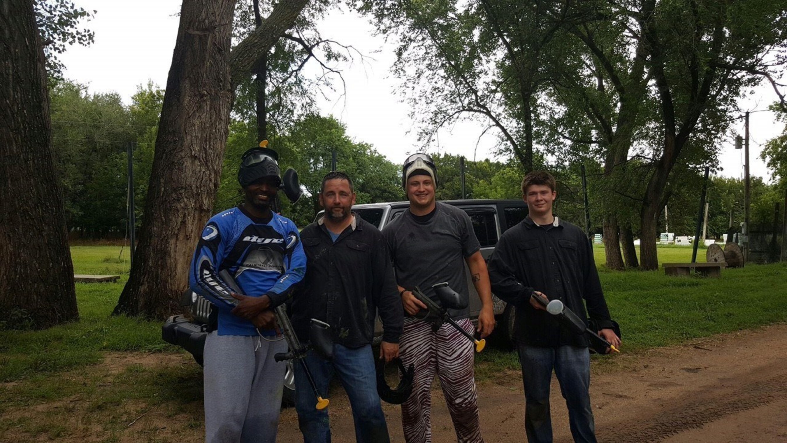 Veterans and guests braved the rain for an afternoon of paintball at Graffiti LLC.