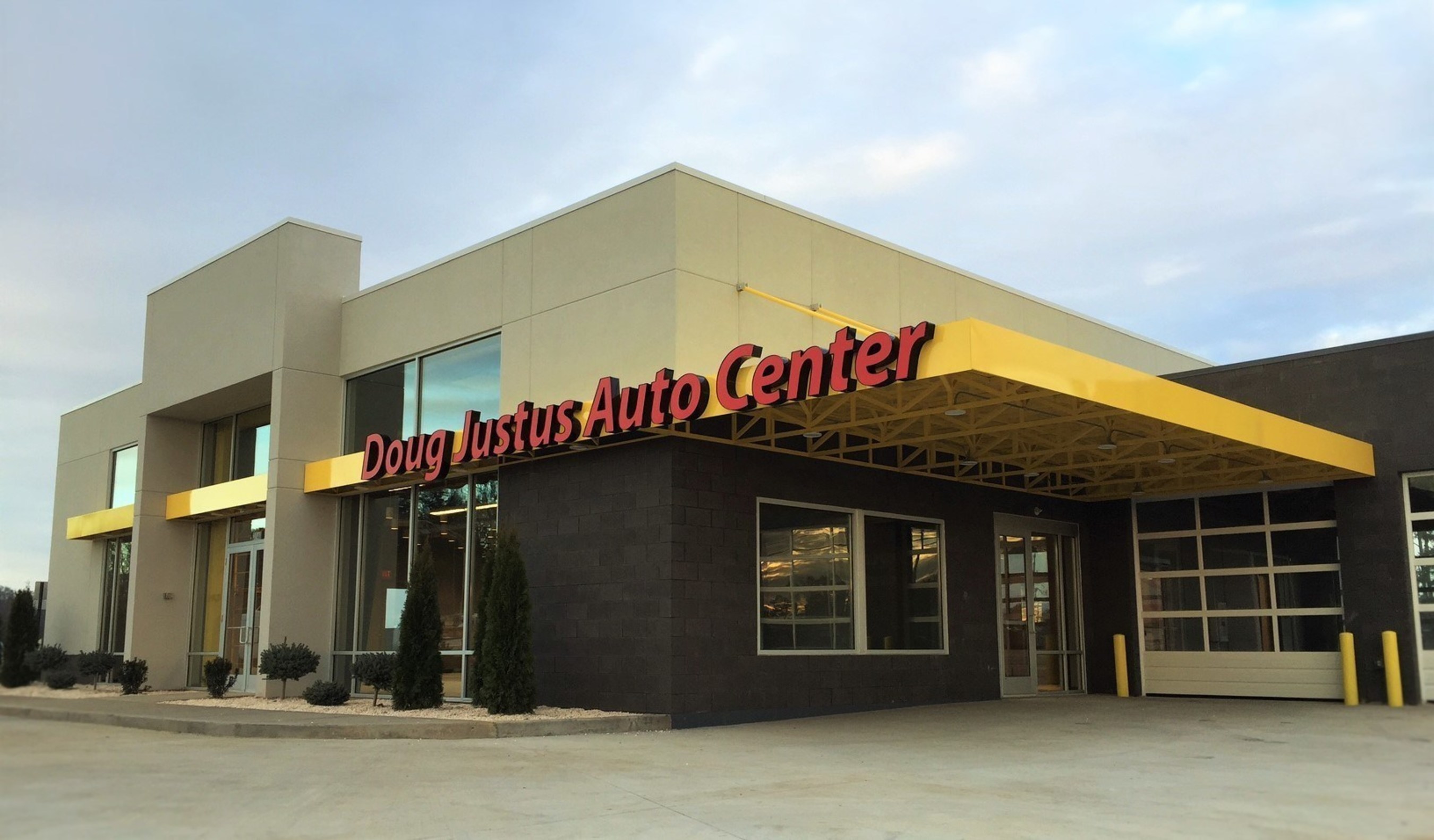The all-new 4,680 sq. ft. Doug Justus Auto Center differentiates itself from traditional pre-owned automotive dealers by providing a contemporary interior and exterior design similar to the approach that many new, modern auto dealerships have embraced.