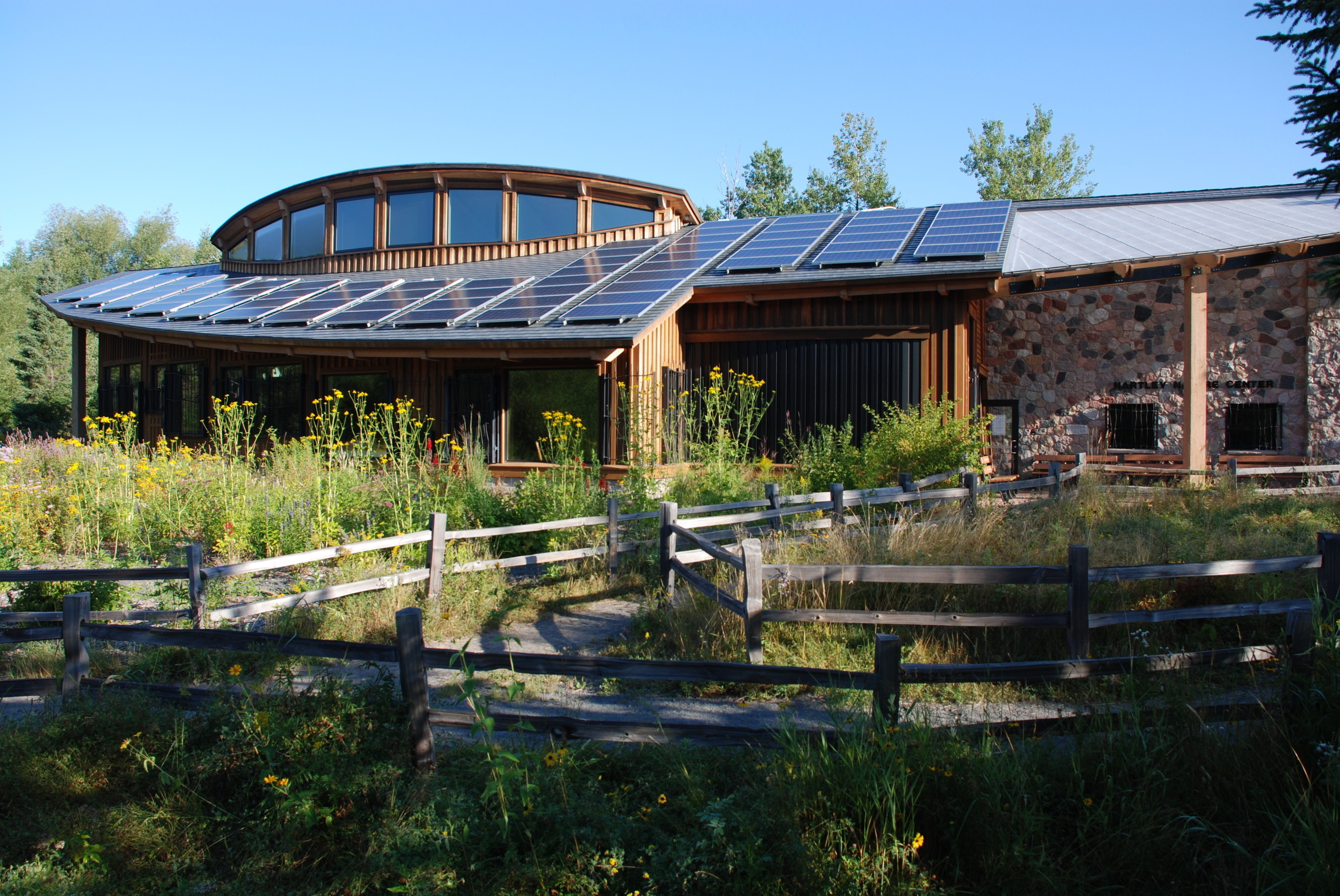 Duluth-based Hartley Nature Center installs Sunverge energy storage system to provide community phone charging station during grid outages.