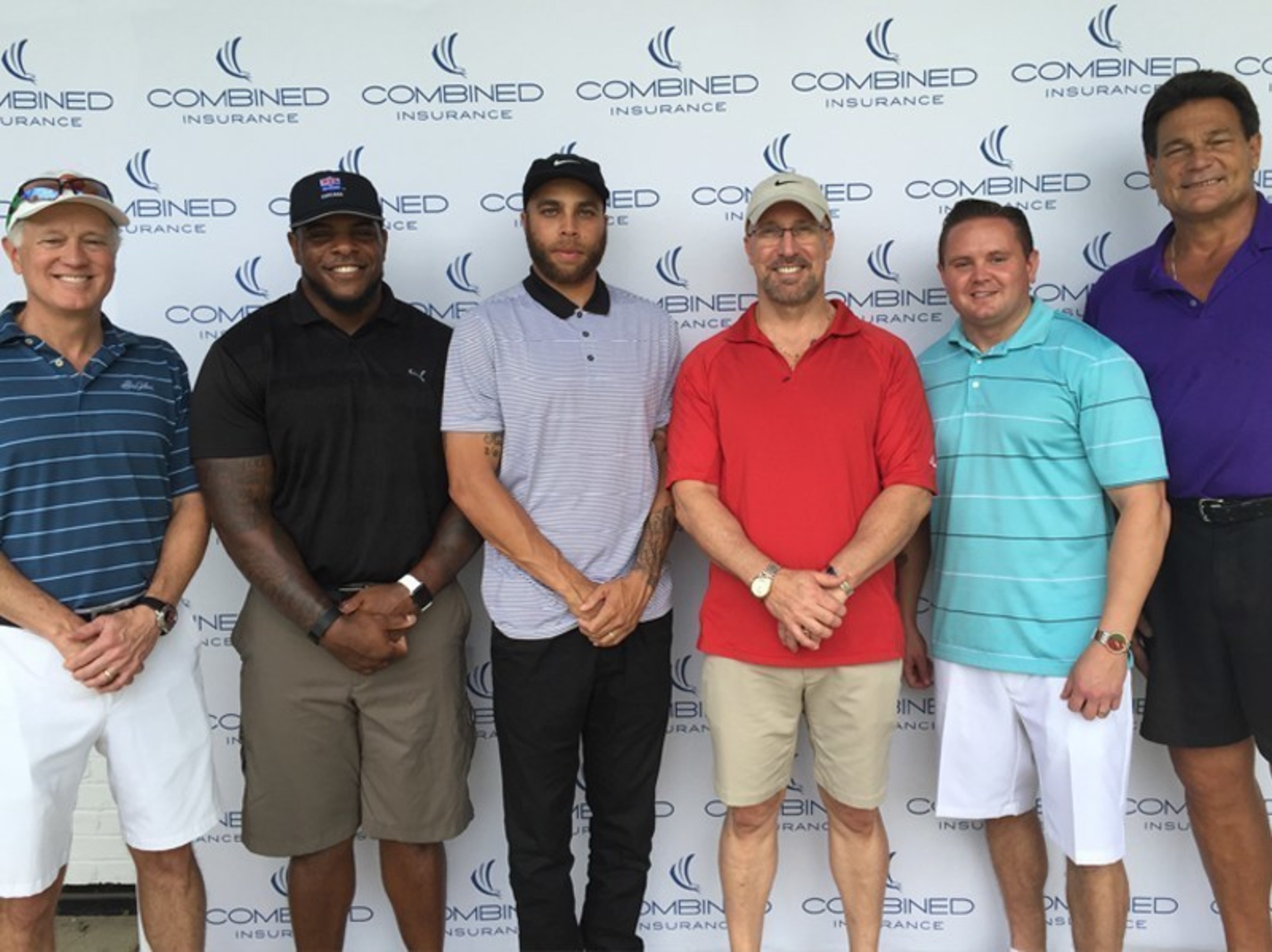 (L to R) Ed Clancy, Executive Vice President, Global Accident & Health and Life, Chubb Group, Jason McKie, Johnny Knox, Brad Bennett, President, Combined Insurance, Joseph Pennington, National Military Program Manager, Combined Insuance, and Dan Hampton give back at the Combined Insurance Golf Outing to benefit The Jason McKie Foundation.
