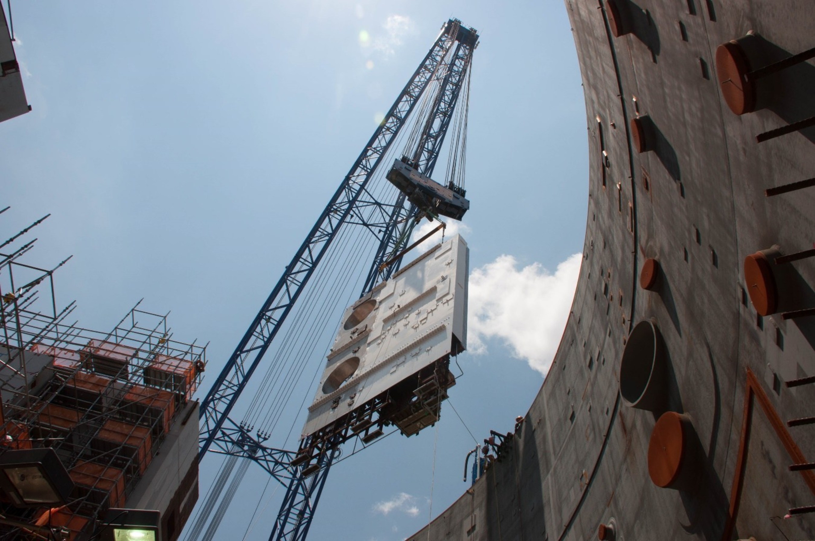 The CA02 module, weighing 52-tons, is lowered into place at the Vogtle Unit 3 nuclear island. This placement completes the "Big 6" modules for Unit 3 which also include the previously placed CA01, CA04, CA05 and CA20.