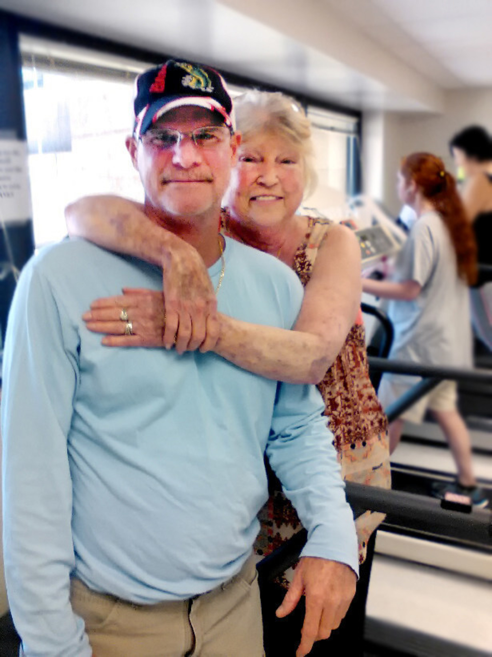 Patricia McDaris, 64, takes a break from the treadmill to pose with her son, John McDaris. Before her lung transplant, McDaris couldn't walk because of her decreased lung function. Now she can work out, take long walks and get back to fully enjoying life. McDaris has health coverage through Staywell Heath Plan, a WellCare health plan dedicated to serving Medicaid members in Florida. "I'm still amazed at how brilliant the doctors are and my insurance, the hospital, the hotel, my son, all the people I have come into contact with," she said.