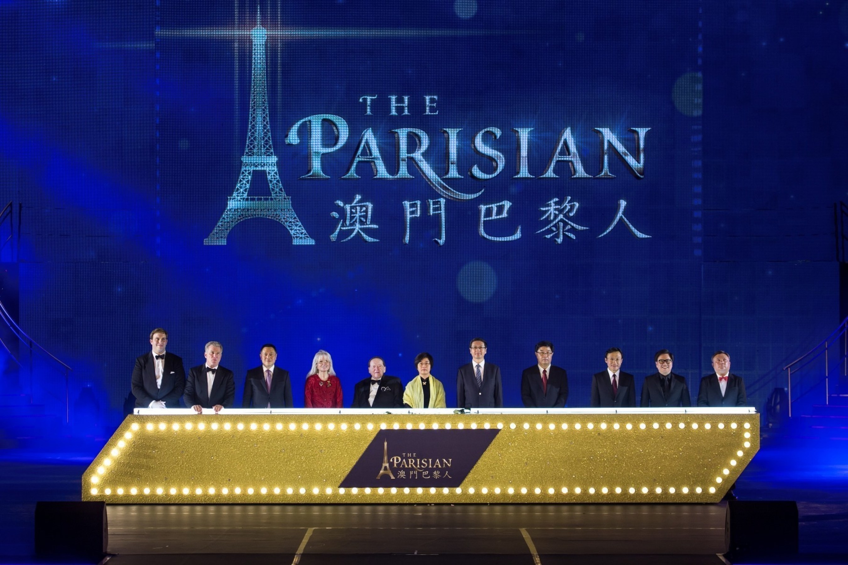 Guests of honor, including Las Vegas Sands and Sands China executives, and Macao government officials, officiate the grand opening of The Parisian Macao Tuesday.