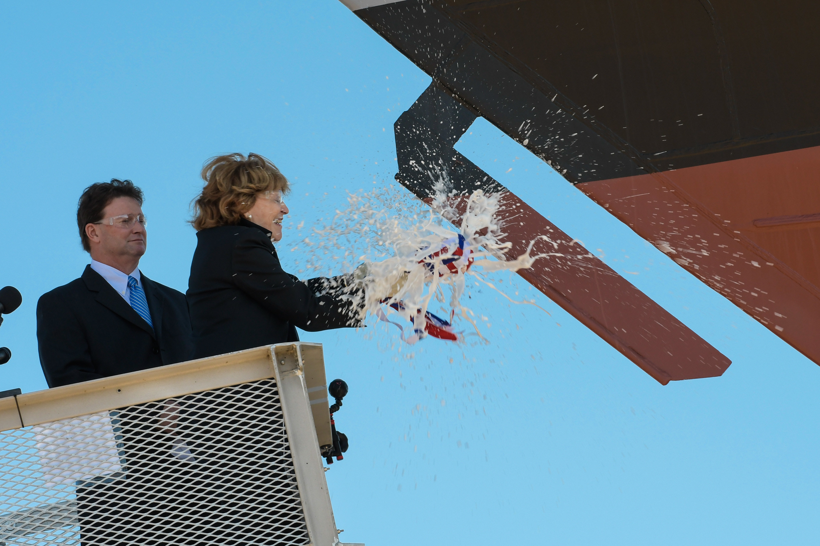 Ship sponsor Kate Lehrer breaks a bottle of champagne across the bow during the christening ceremony for the nation's 13th Littoral Combat Ship, the future USS Wichita, at the Fincantieri Marinette Marine shipyard on Sept. 17.