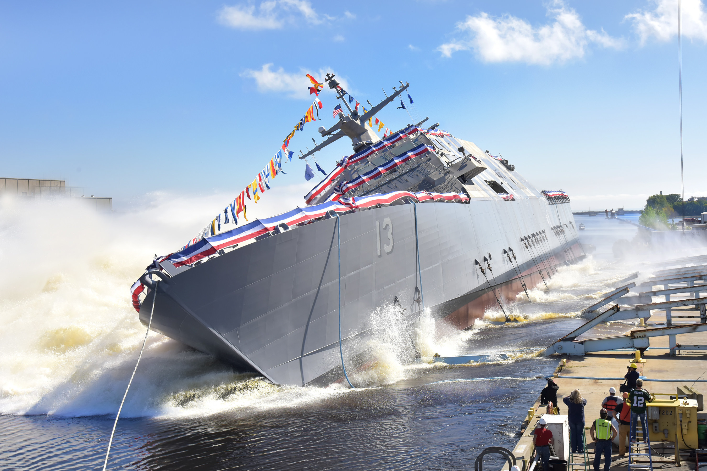 The 13th Littoral Combat Ship, the future USS Wichita launches sideways into the Menominee River in Marinette, Wisconsin, on Sept. 17. Once commissioned, LCS 13 will be the third ship to carry the name of Wichita, Kansas.