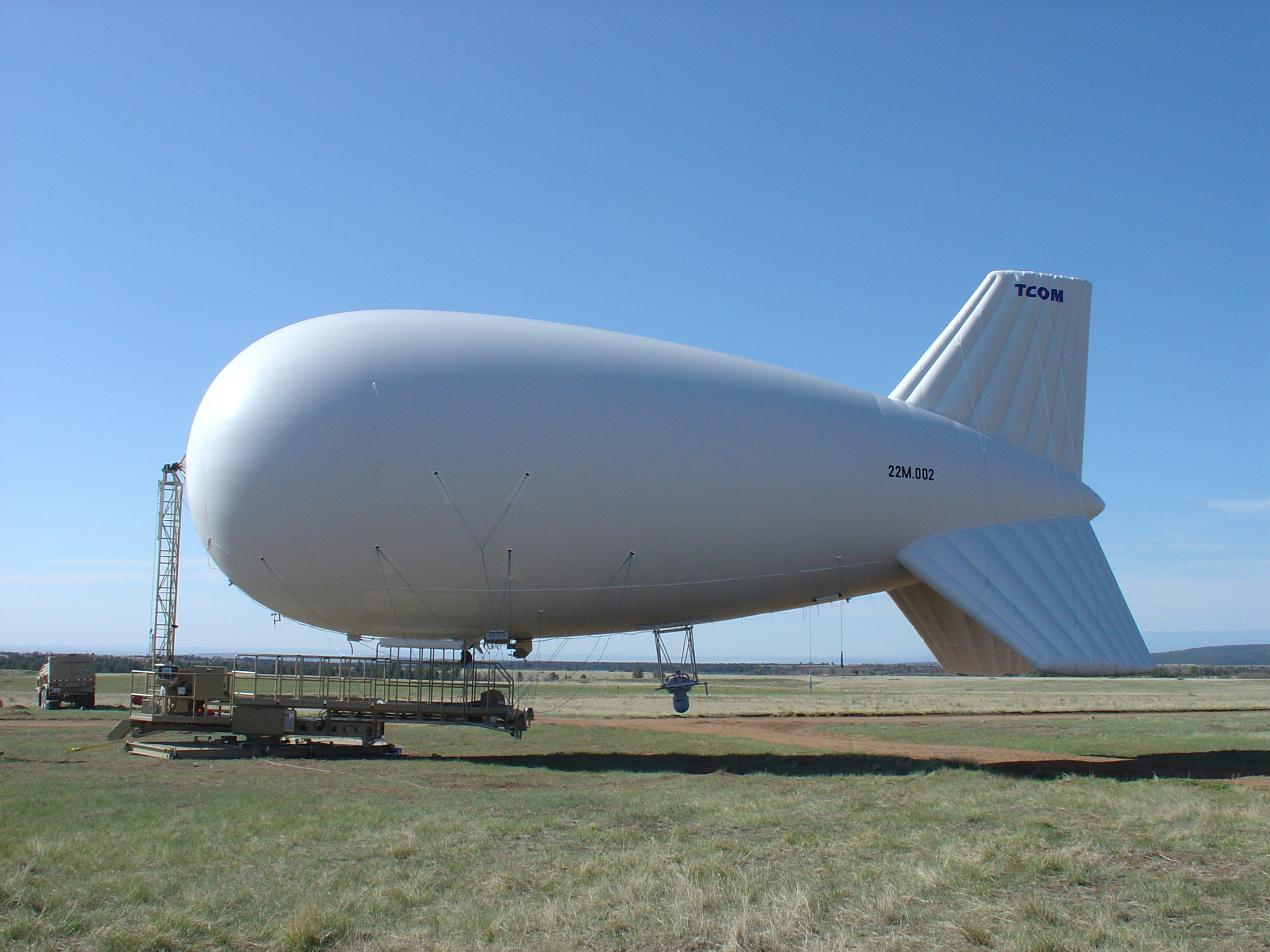 Persistent surveillance and threat detection systems, like those developed by Lockheed Martin and TCOM (pictured here), have proven especially effective in identifying improvised explosive devices, tracking insurgent movements and monitoring other suspicious activity. The companies are subcontractors to Bravura, who will manage the U.S. Army's aerostats under a new U.S. Army contract called Persistent Surveillance Systems - Tethered. Photo courtesy TCOM.