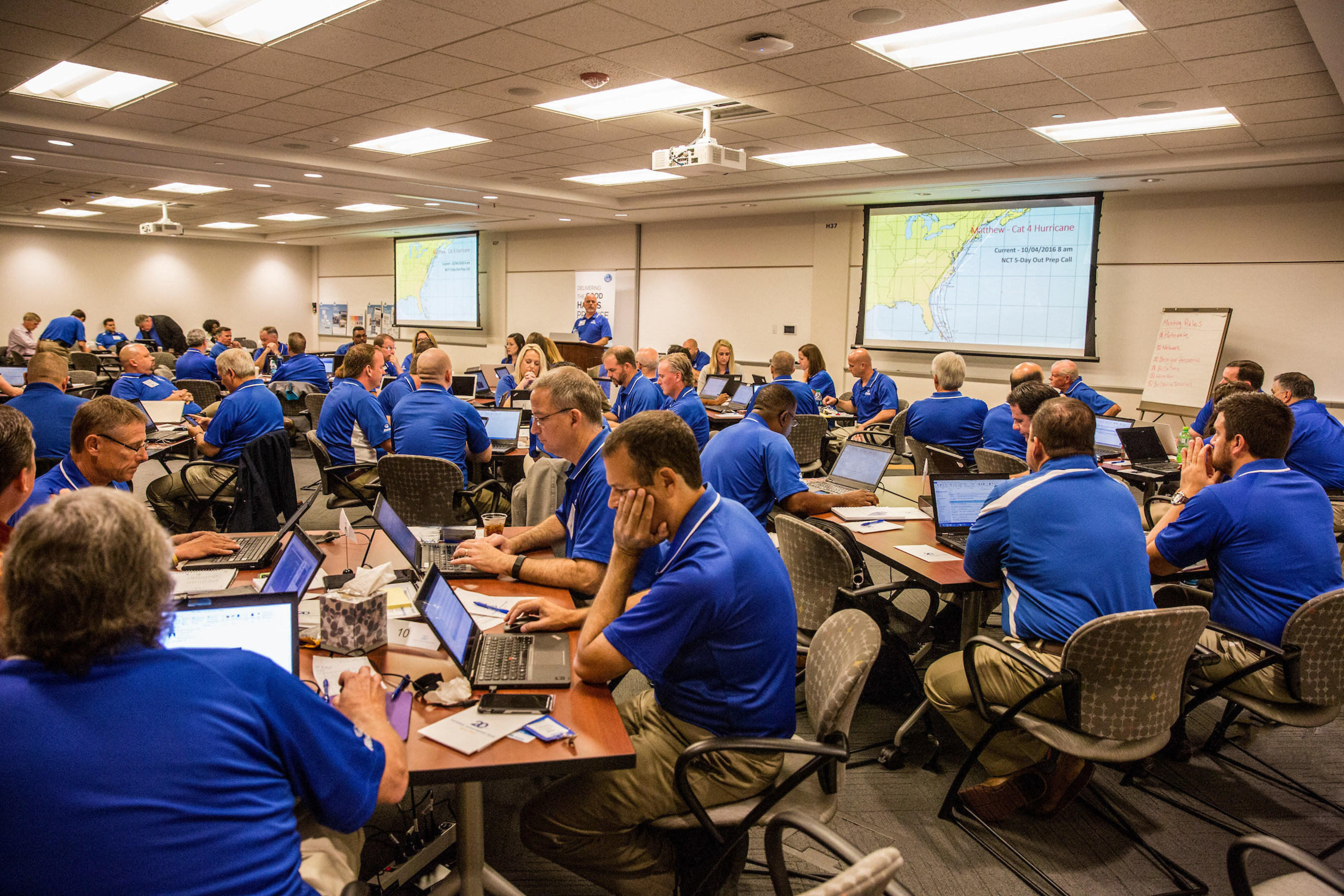 Claim personnel turn conference room into command center to prep for approaching storm