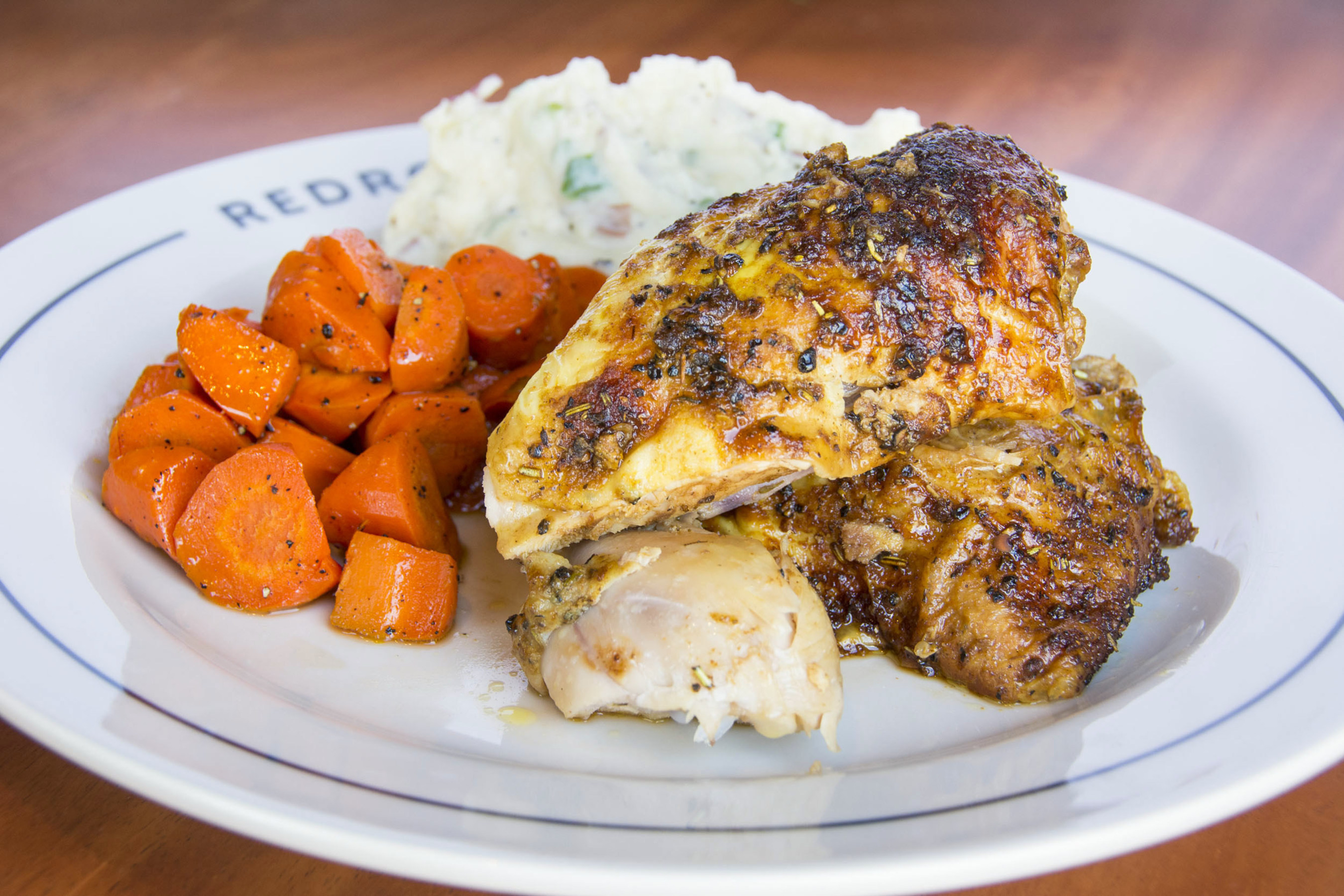 Redrock Canyon Grill's Signature Wood-Fired Rotisserie Chicken