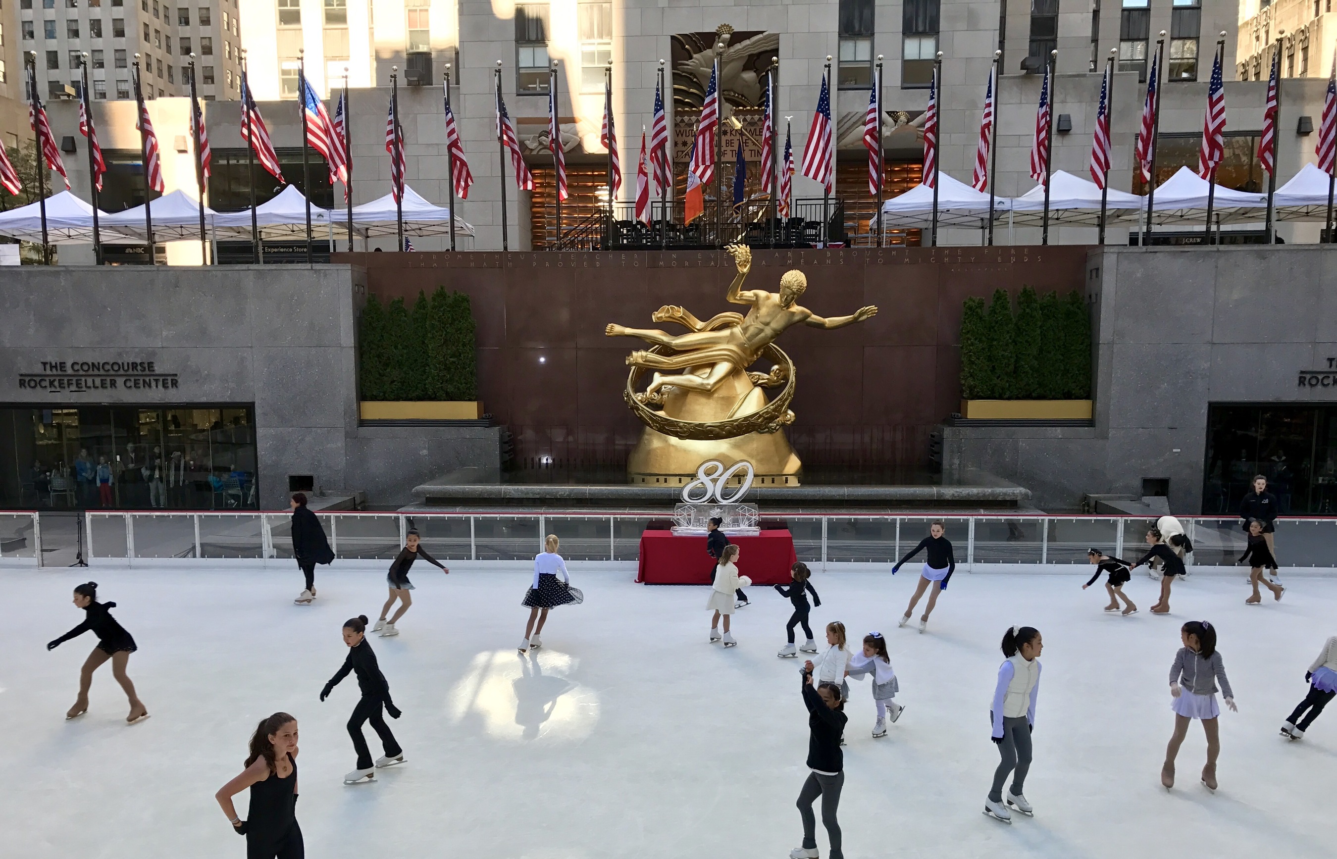 Young skaters take the ice during the official first skate at The Rink at Rockefeller Center on October 11, 2016. The Rink celebrates its 80th anniversary season this year. (Photo credit: Rick Ho)