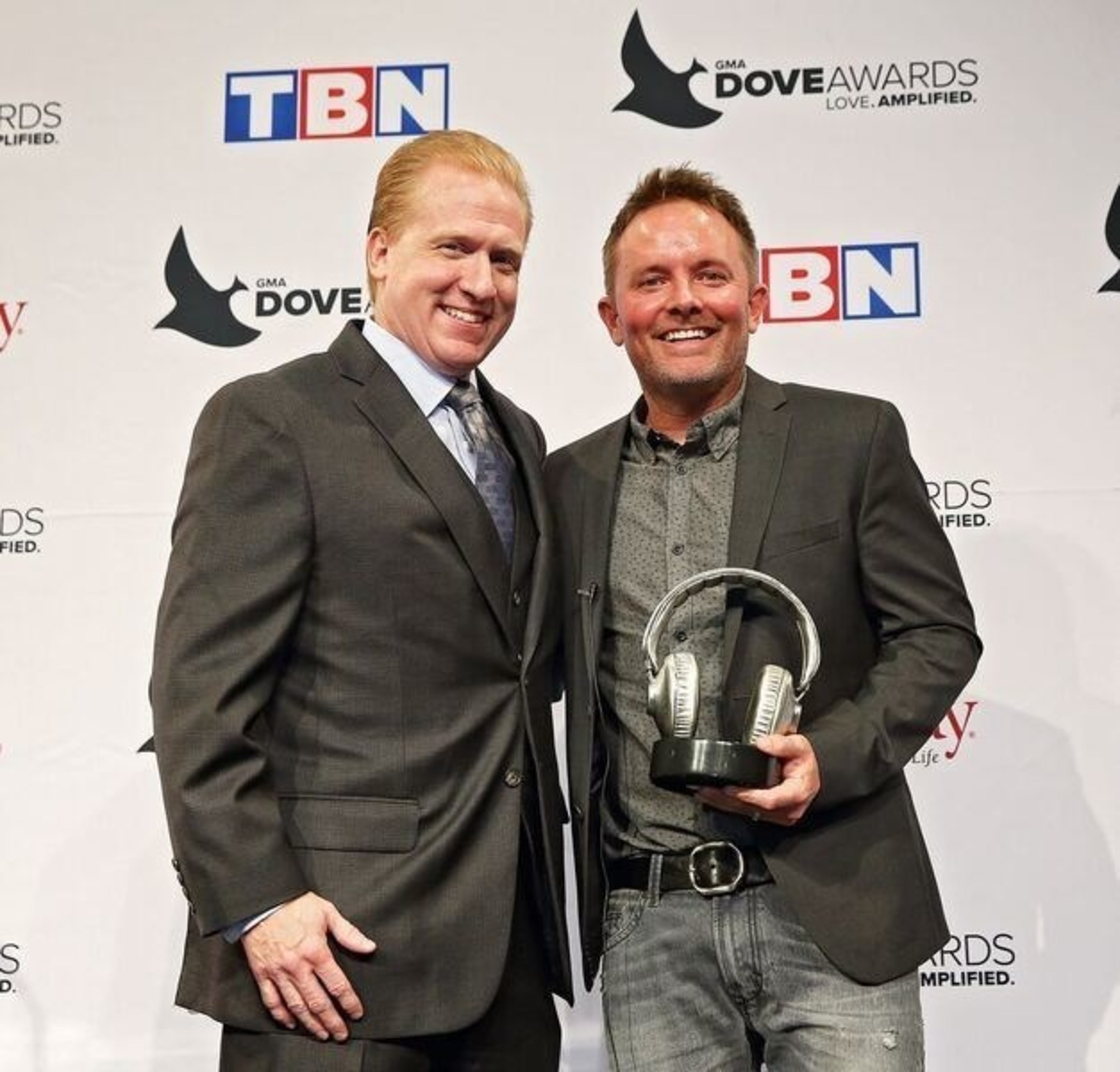 SoundExchange President and CEO Michael Huppe (left) presents GRAMMY(R) award-winning contemporary Christian artist Chris Tomlin with the SoundExchange Digital Radio Award on October 11 during the 47th Annual Gospel Music Association (GMA) Dove Awards. SoundExchange honors recording artists with its Digital Radio Award once they amass more than one billion streams on the 2,800 digital radio services with whom they partner. (Photo by  Kayla Schoen for SoundExchange).