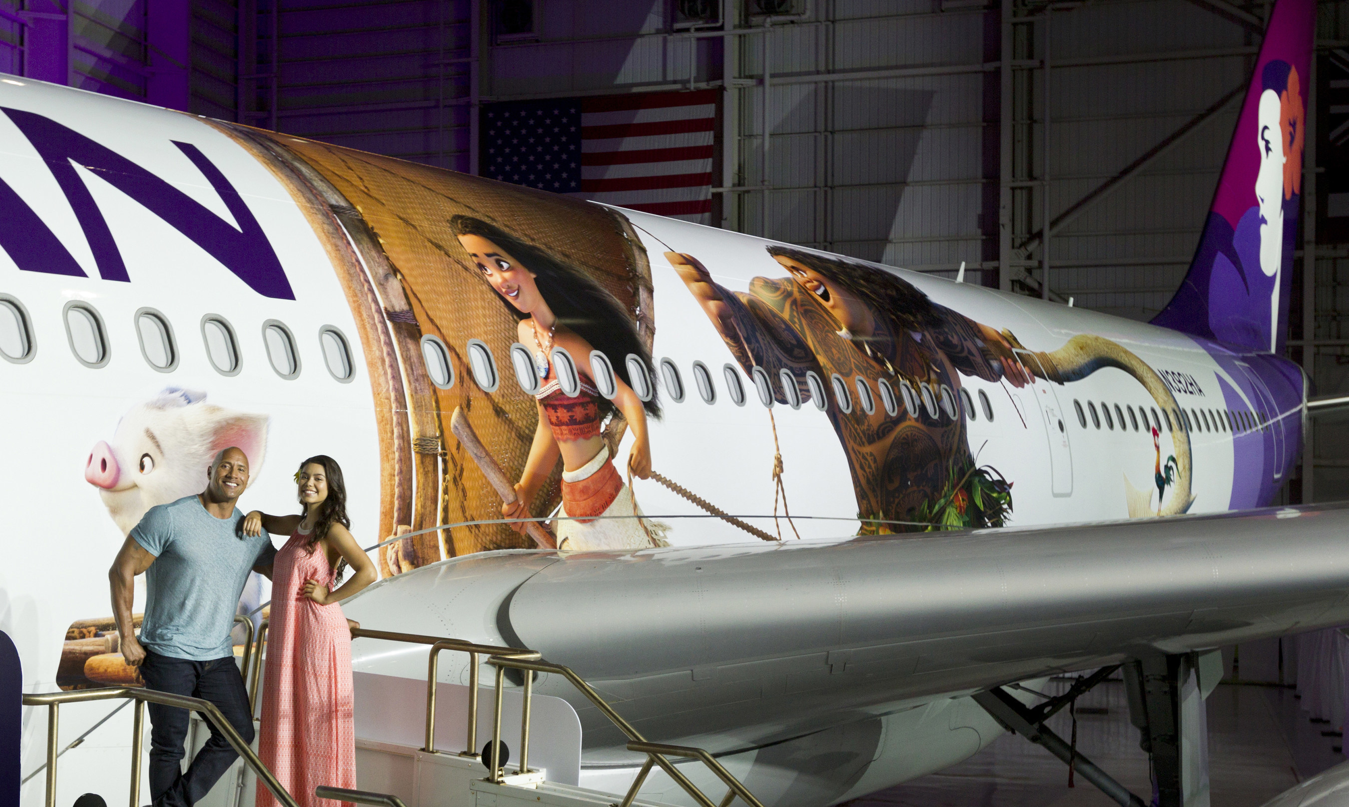 Hawaiian Airlines today revealed the first of three "Moana"-themed planes at its home base at Honolulu International Airport (HNL).  Auli'i Cravalho, the Hawaiʻi-born actress who is the voice of Disney's "Moana," and Dwayne Johnson, the voice of demigod Maui, were among the first to see the inspiring new design. Photo by Donald Traill for Hawaiian Airlines