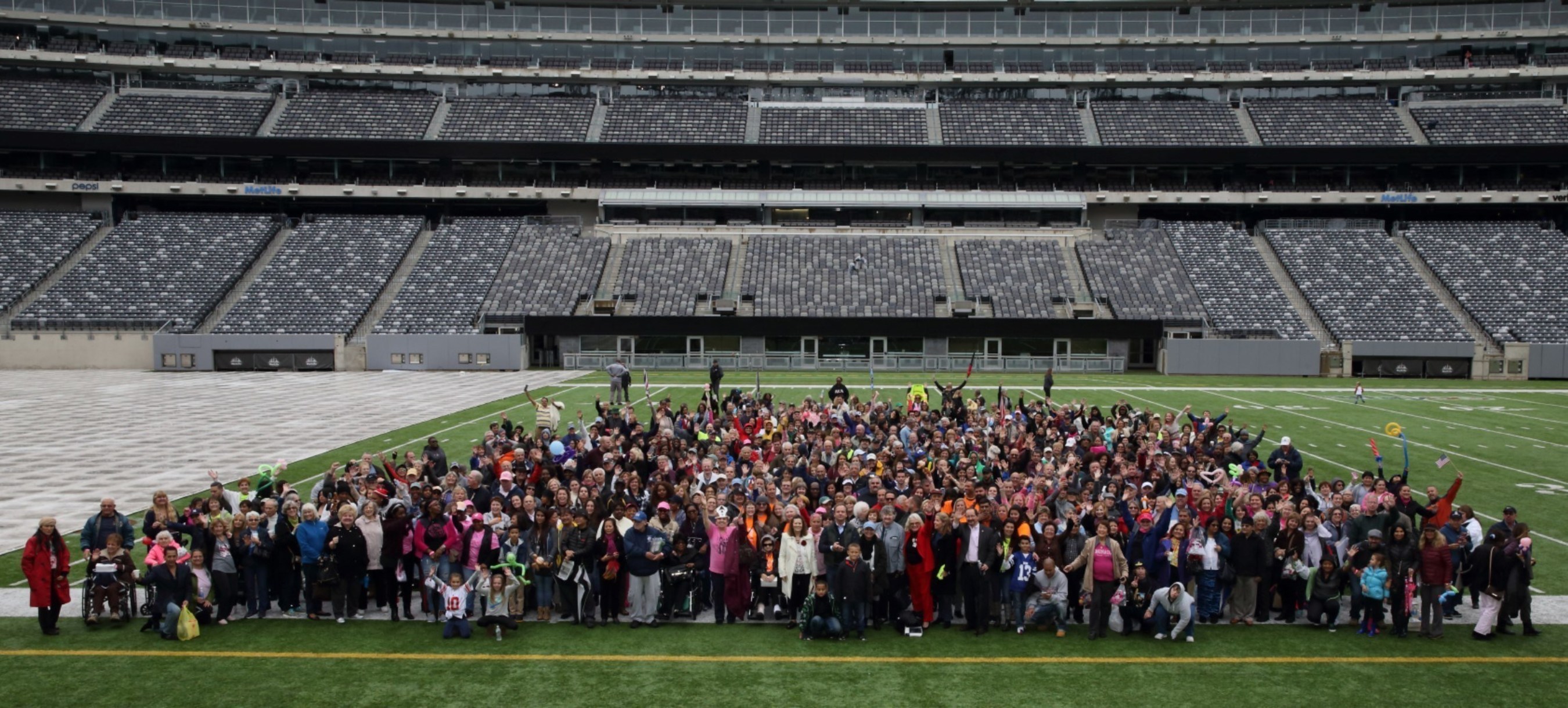 The John Theurer Cancer Center at HackensackUMC celebrated with nearly 4,000 cancer survivors, patients, families and supporters at the Eighth Annual Celebrating Life and Liberty Event on Sunday, October 9, at MetLife Stadium. The crowd gathers on the 50-yard line for the event's highest attendance to date.