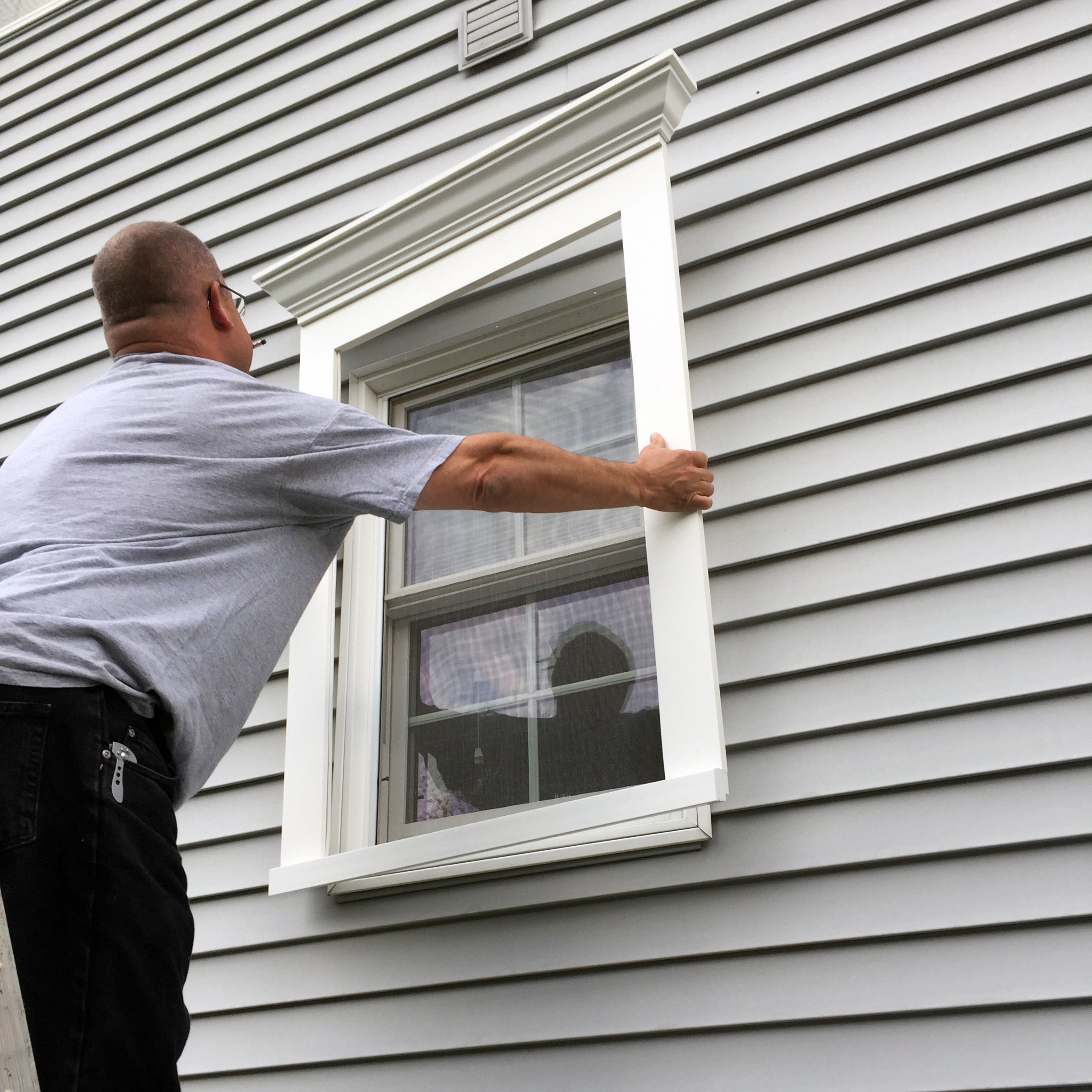 removing the existing window trim
