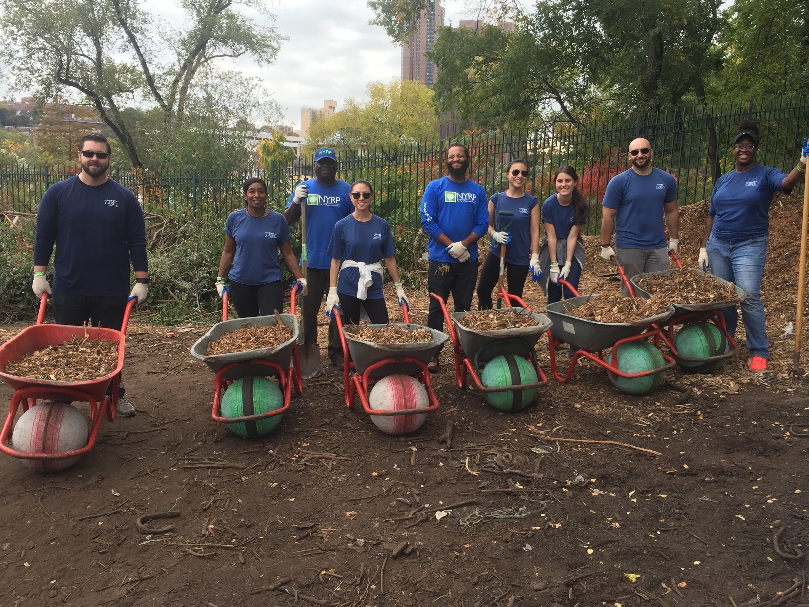 WebMD Cares Impact Day 2016 - NYC WebMD employees and NYRP staff work to mulch Sherman Creek park in Manhattan.