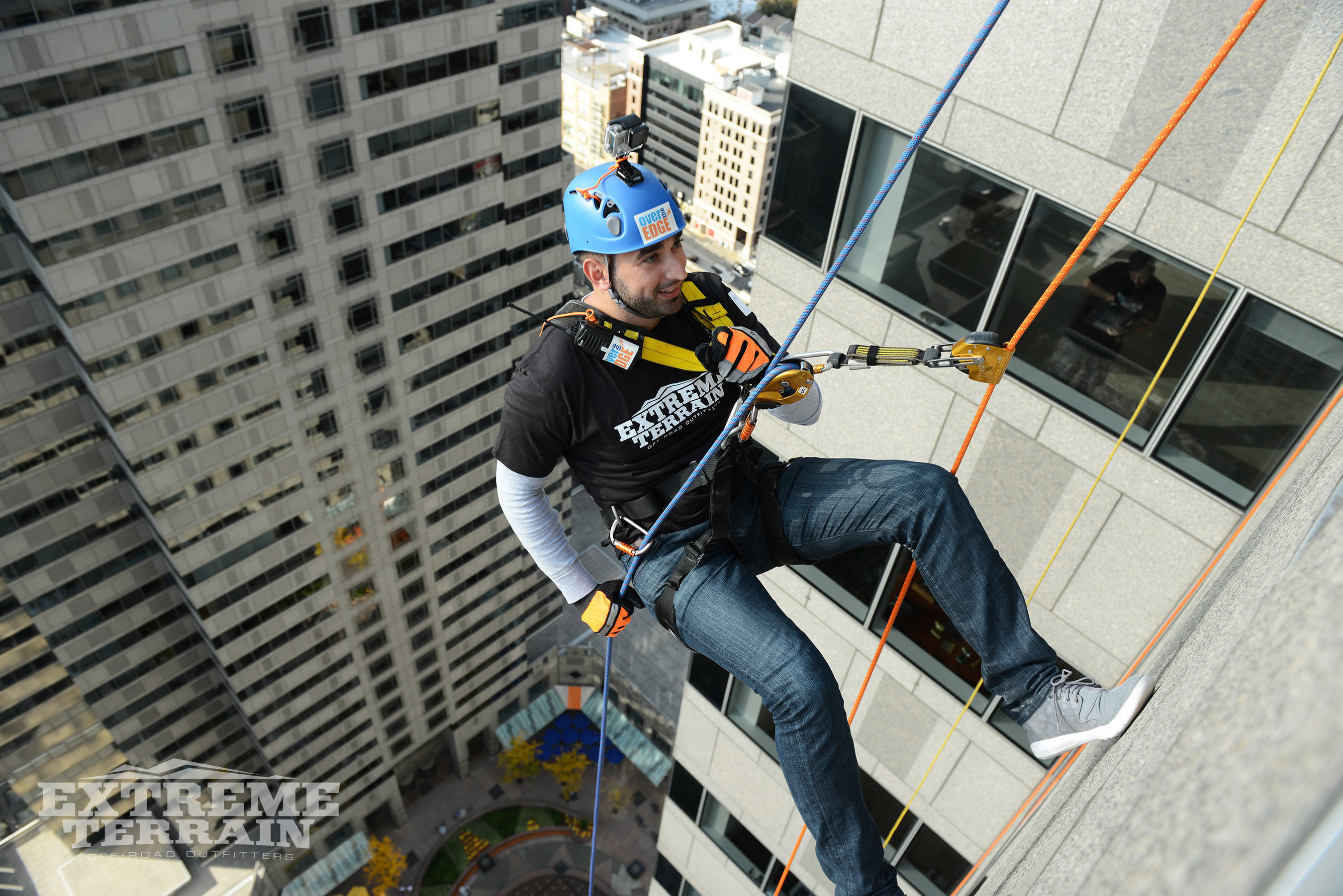 ExtremeTerrain CEO Steve Voudouris rappels down 29 stories above the Philadelphia skyline.