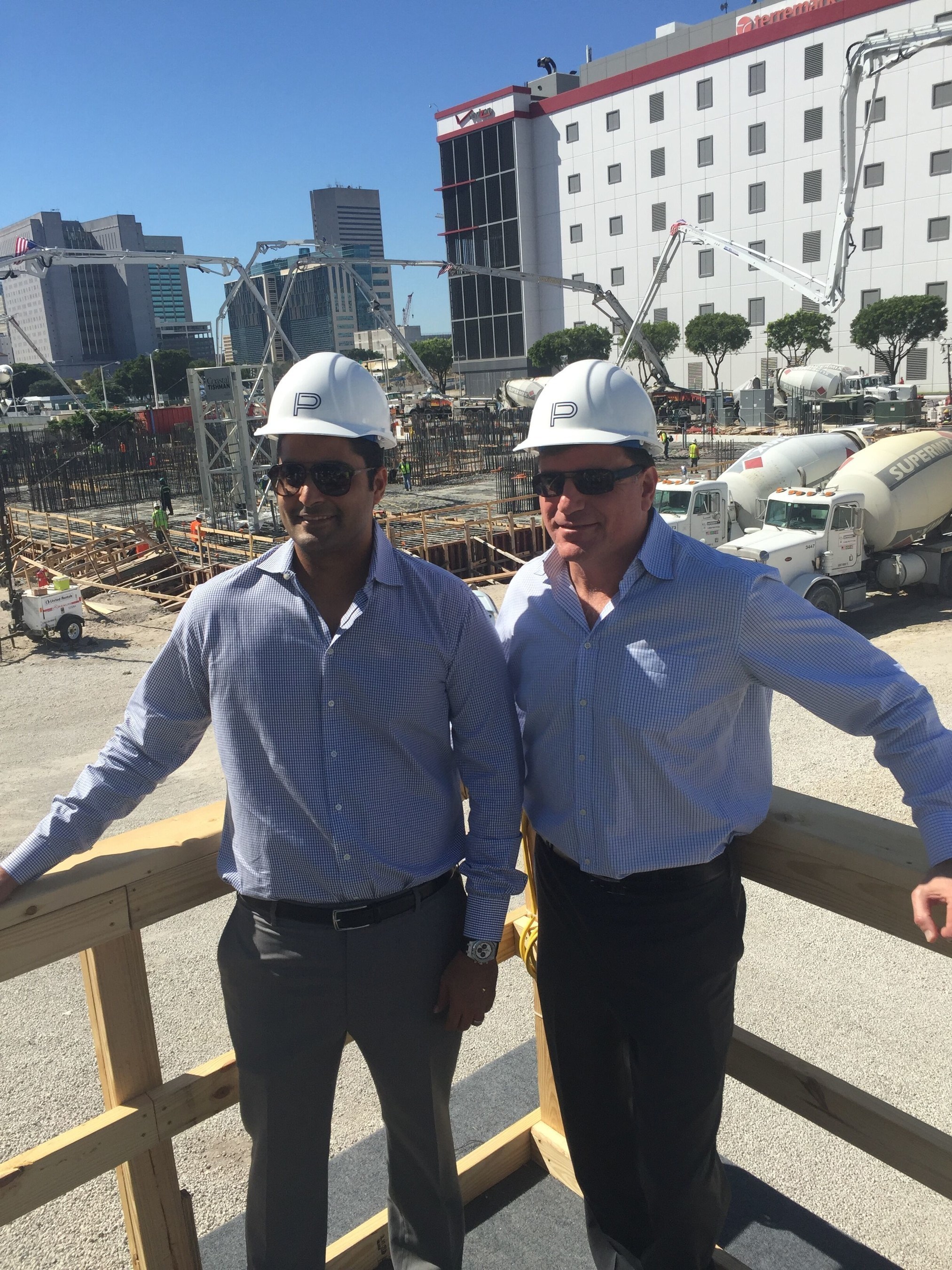 Nitin Motwani, Managing Principal, Miami Worldcenter (LEFT) and Daniel Kodsi, Paramount Miami Worldcenter (RIGHT) with "Big Pour" Foundation in Background