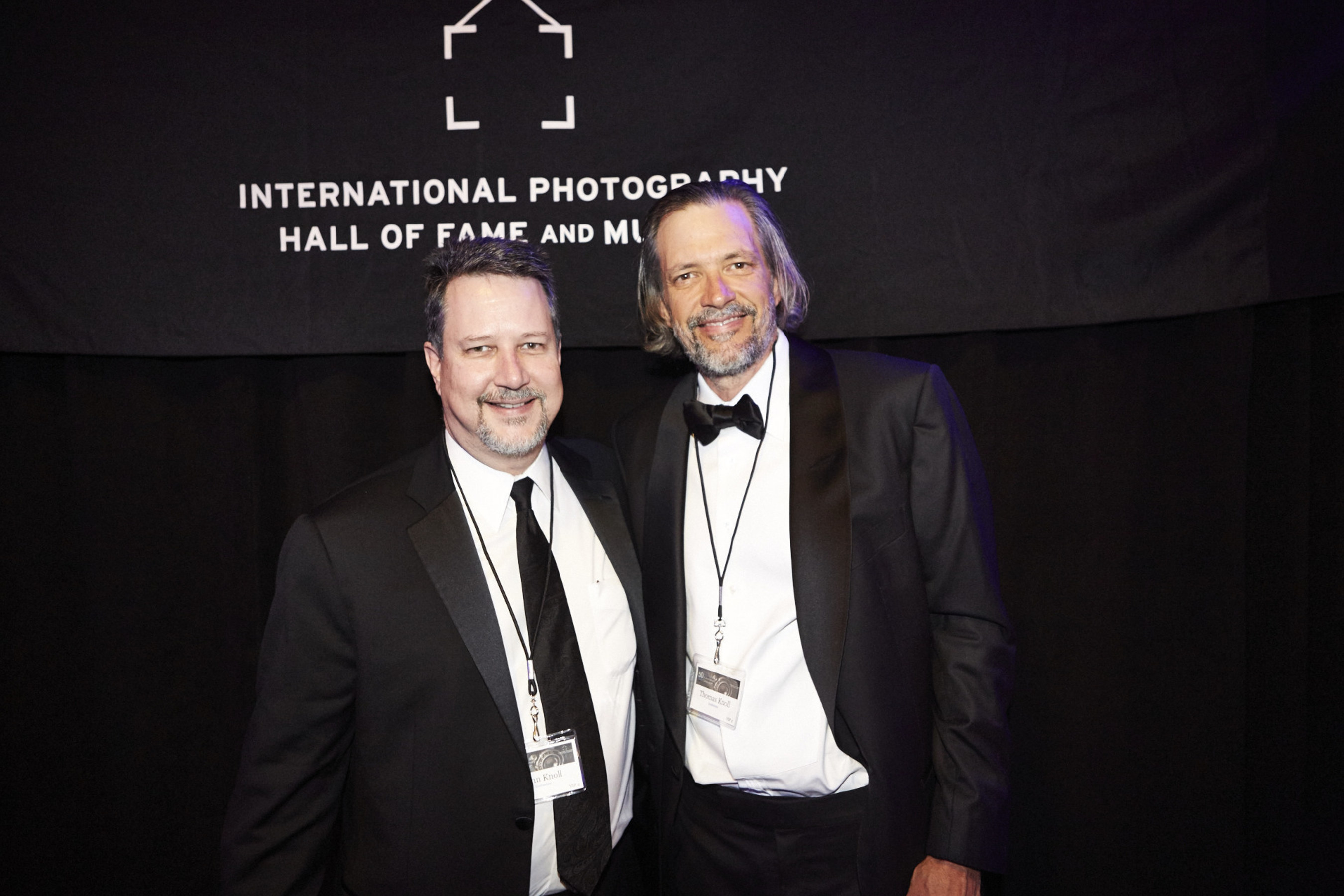 John and Thomas Knoll, co-creators of Adobe Photoshop and brothers, celebrate their induction into the International Photography Hall of Fame and Museum, located in St. Louis, Mo.