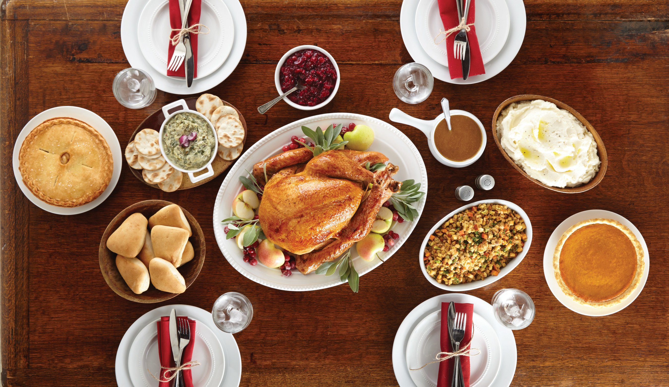 Boston Market Heat & Serve Thanksgiving Meals can feed four to 12 guests. A Thanksgiving meal for 12 includes turkey, mashed potatoes and gravy, cranberry walnut relish, vegetable stuffing, rolls, an appetizer and pies for $9.17 per person.
